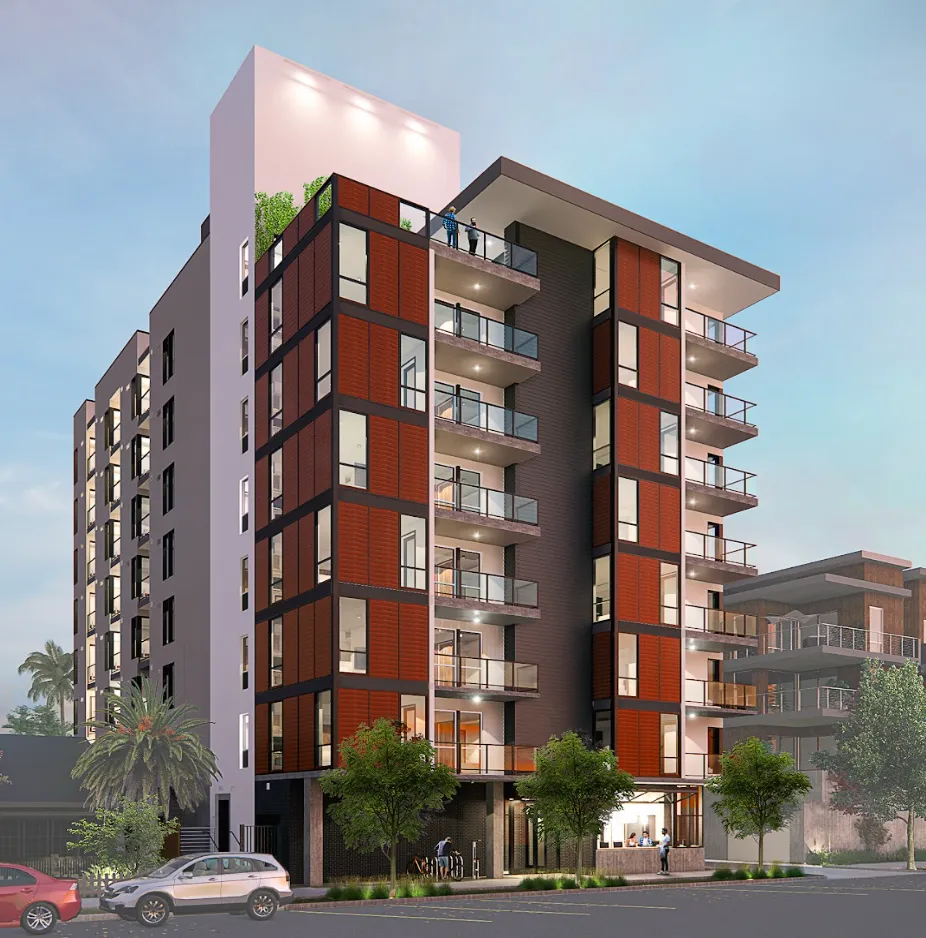 Modern six-story apartment building with balconies, red and black paneling, trees, parked cars, and people near the entrance.