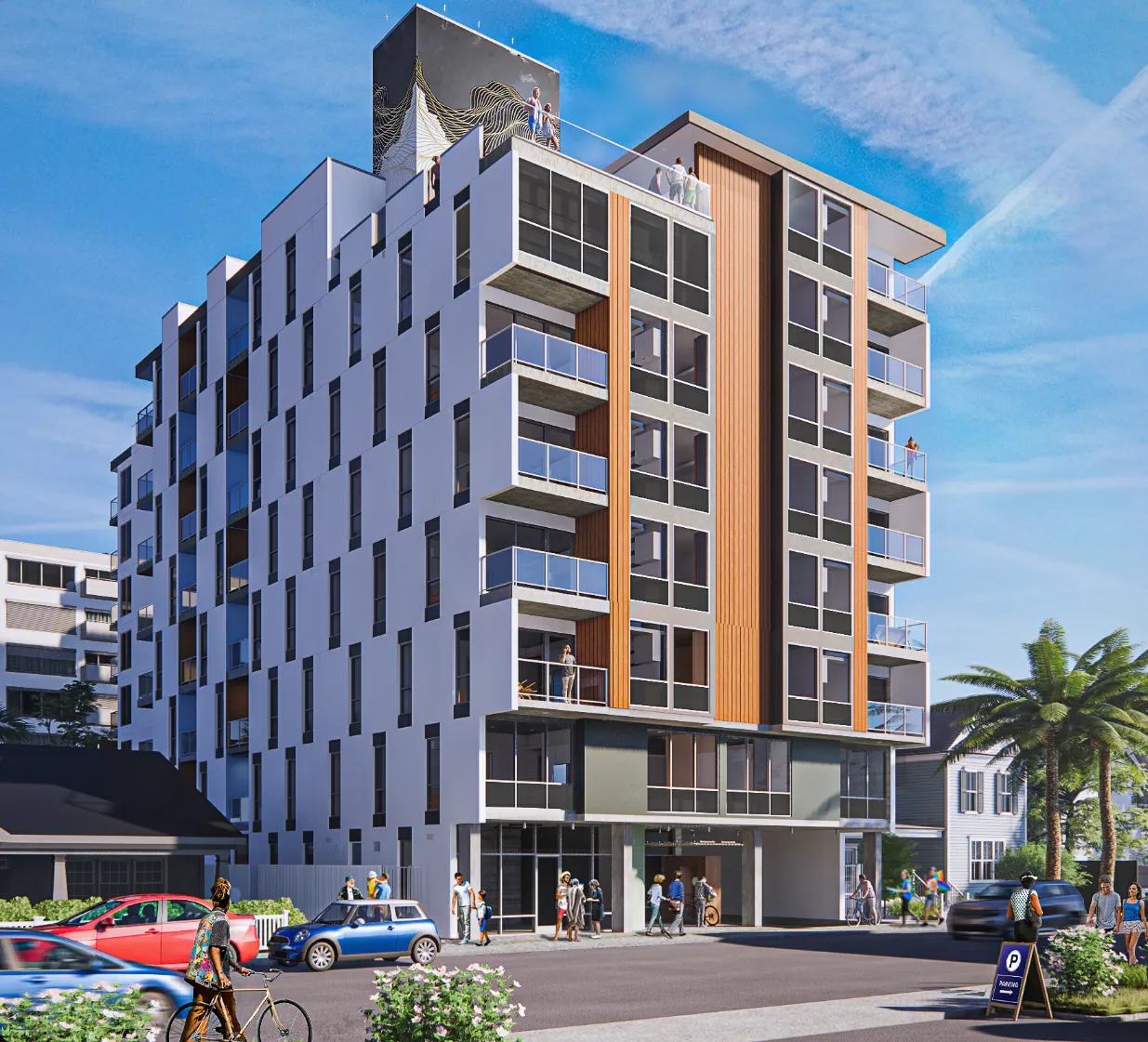 Modern six-story residential building with balconies, large windows, rooftop terrace, and people walking and cycling nearby under a blue sky.
