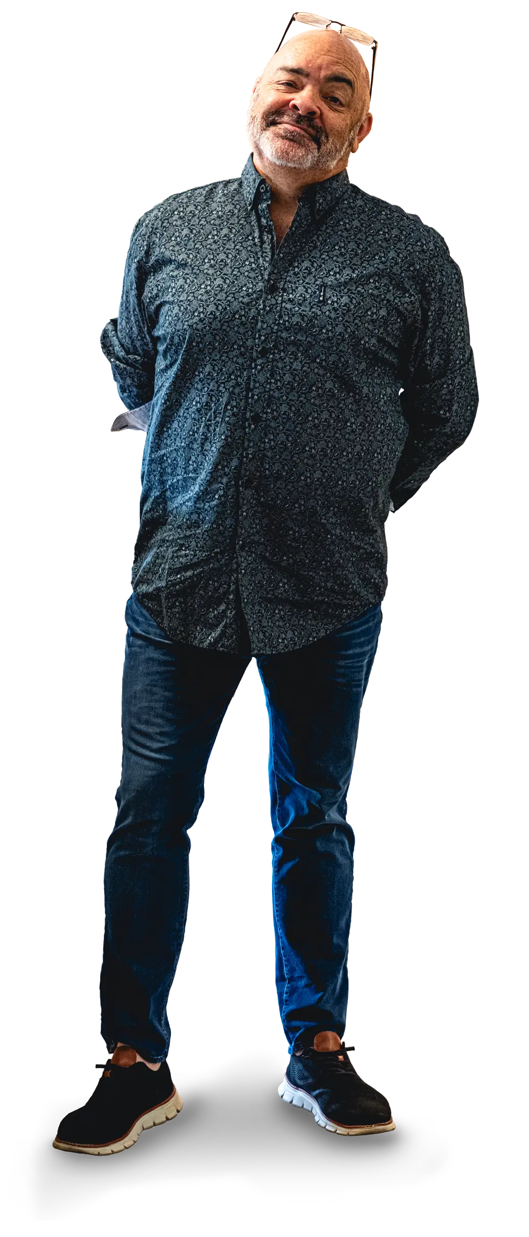 Rob standing with arms behind back.