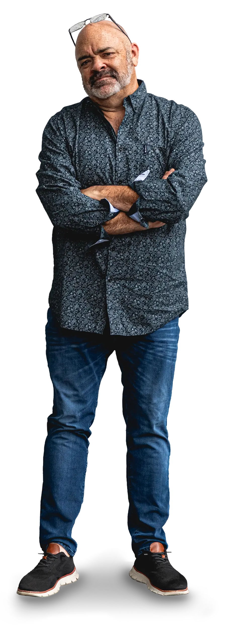 Rob standing with arms crossed.
