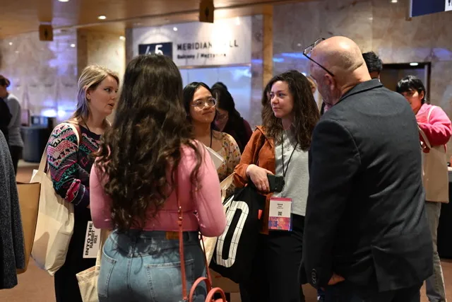 A group of designers speaking to Robert Smith at DesignThinkers 2024