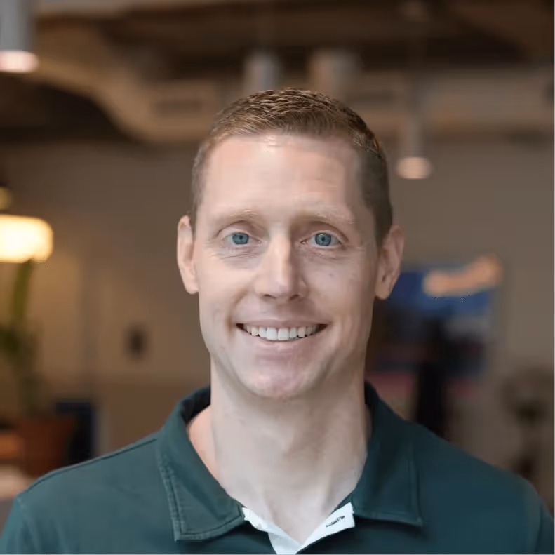 Headshot of Derrick Isaacson