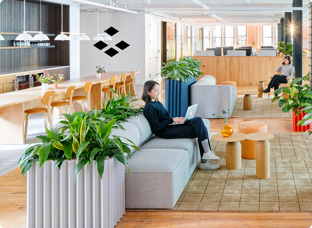 Anchorage Digital team members working in the office lounge
