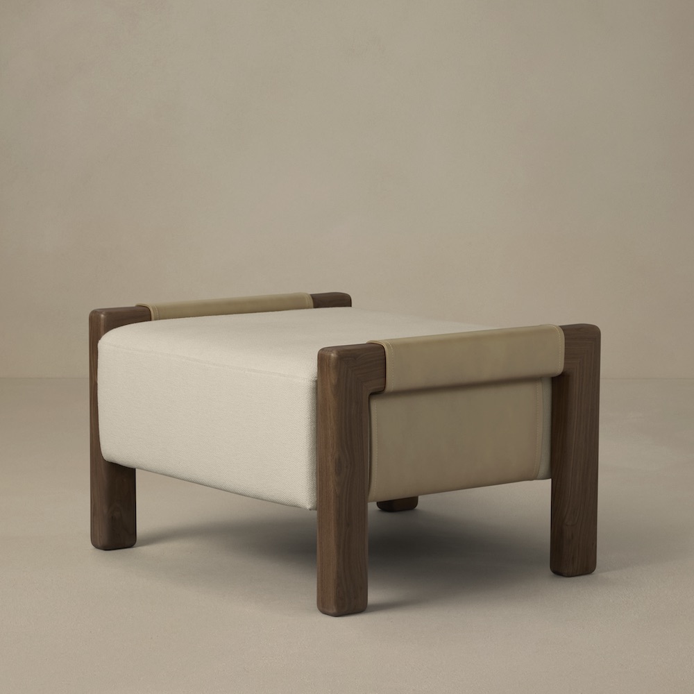 Saddle ottoman, angled view - Carlyle Collective