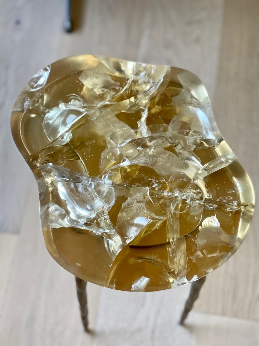 Biago side table, side view - Carlyle Collective