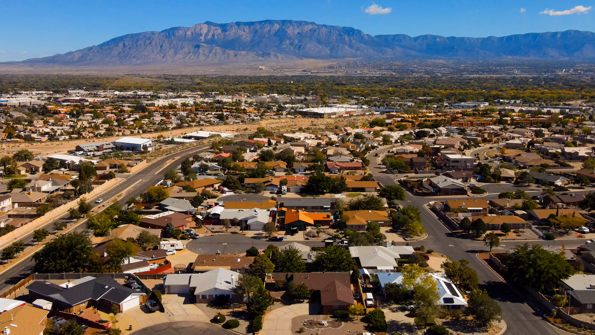 metal roofing project in Eagle Ranch on the west side albuquerque zoomed out showing surrounding homes