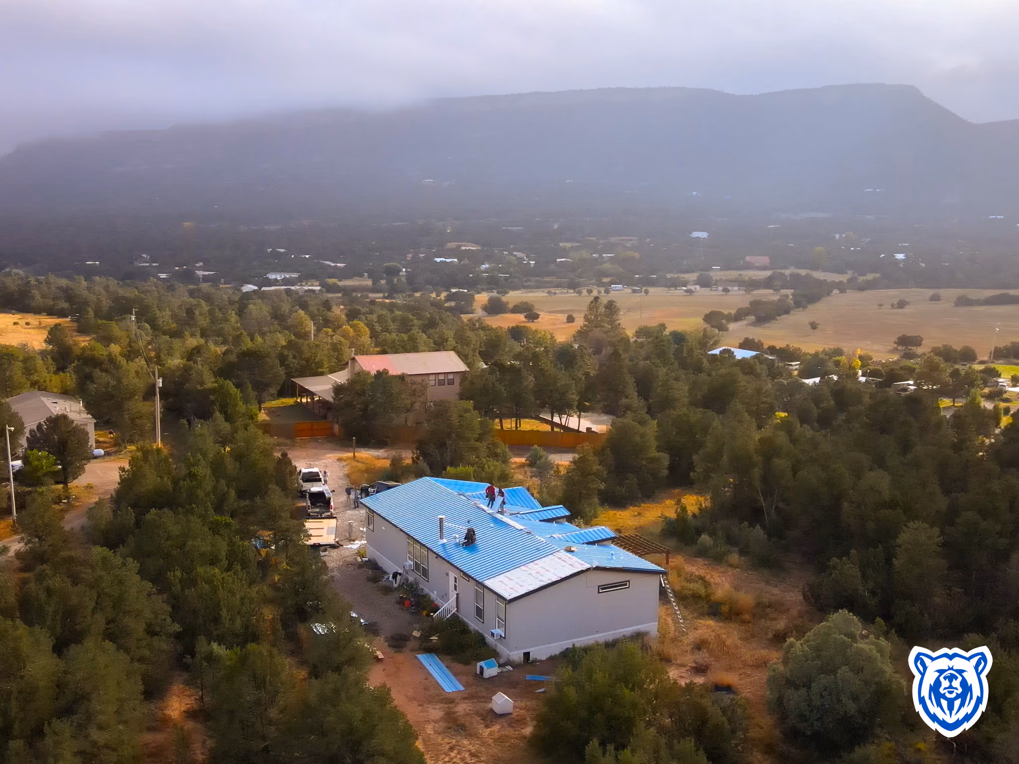 metal roof installation during foggy weather in central New Mexico