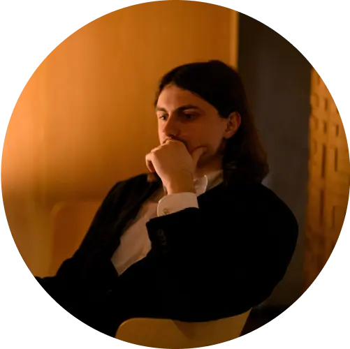 Lazarev.agency employee mysteriously watching something at their corporate party.