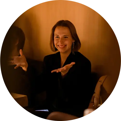 Lazarev.agency employee joyfully sharing a story.