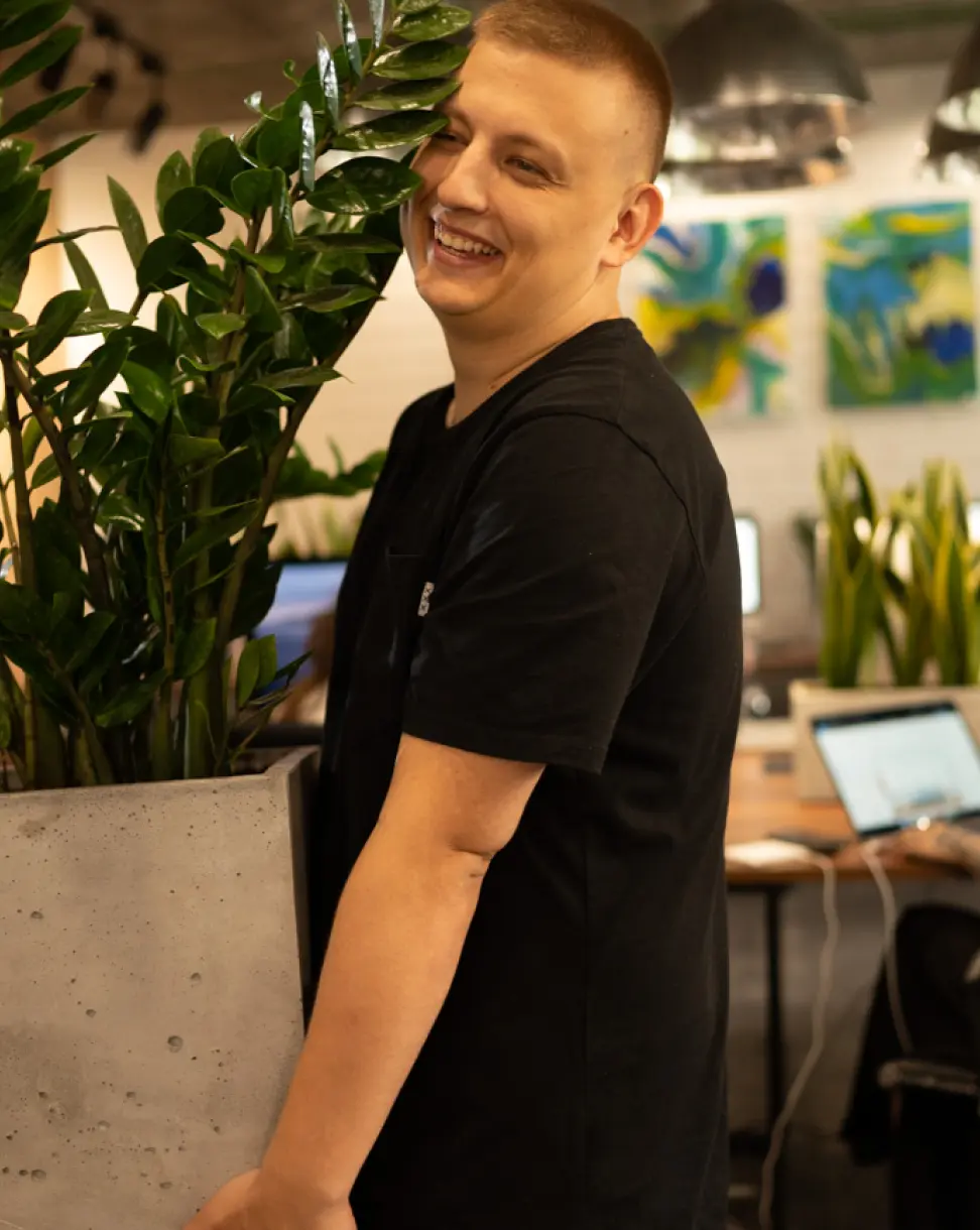 Lazarev.agency Founder with Office Plant