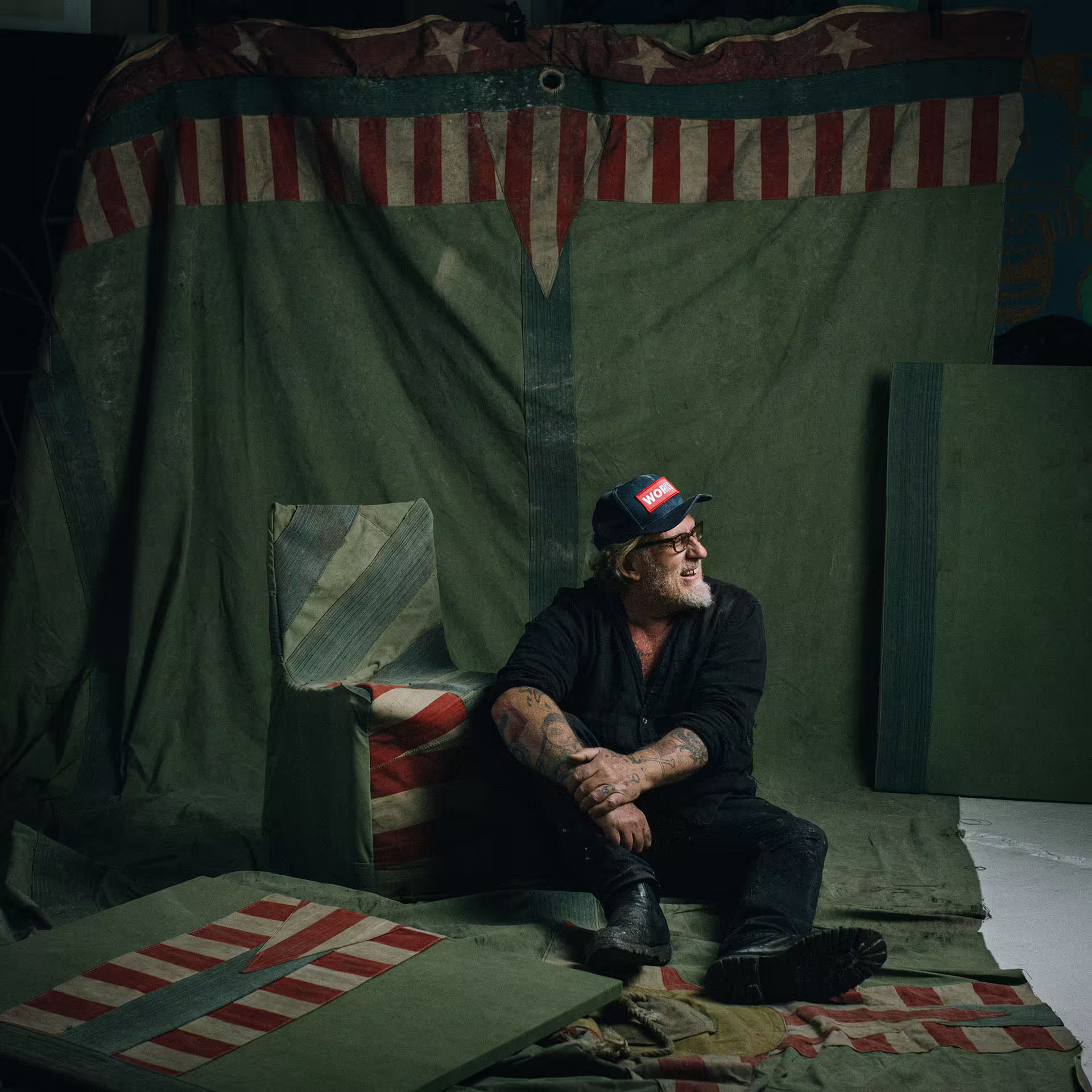 Photograph of David Bromley stitting in a set.
