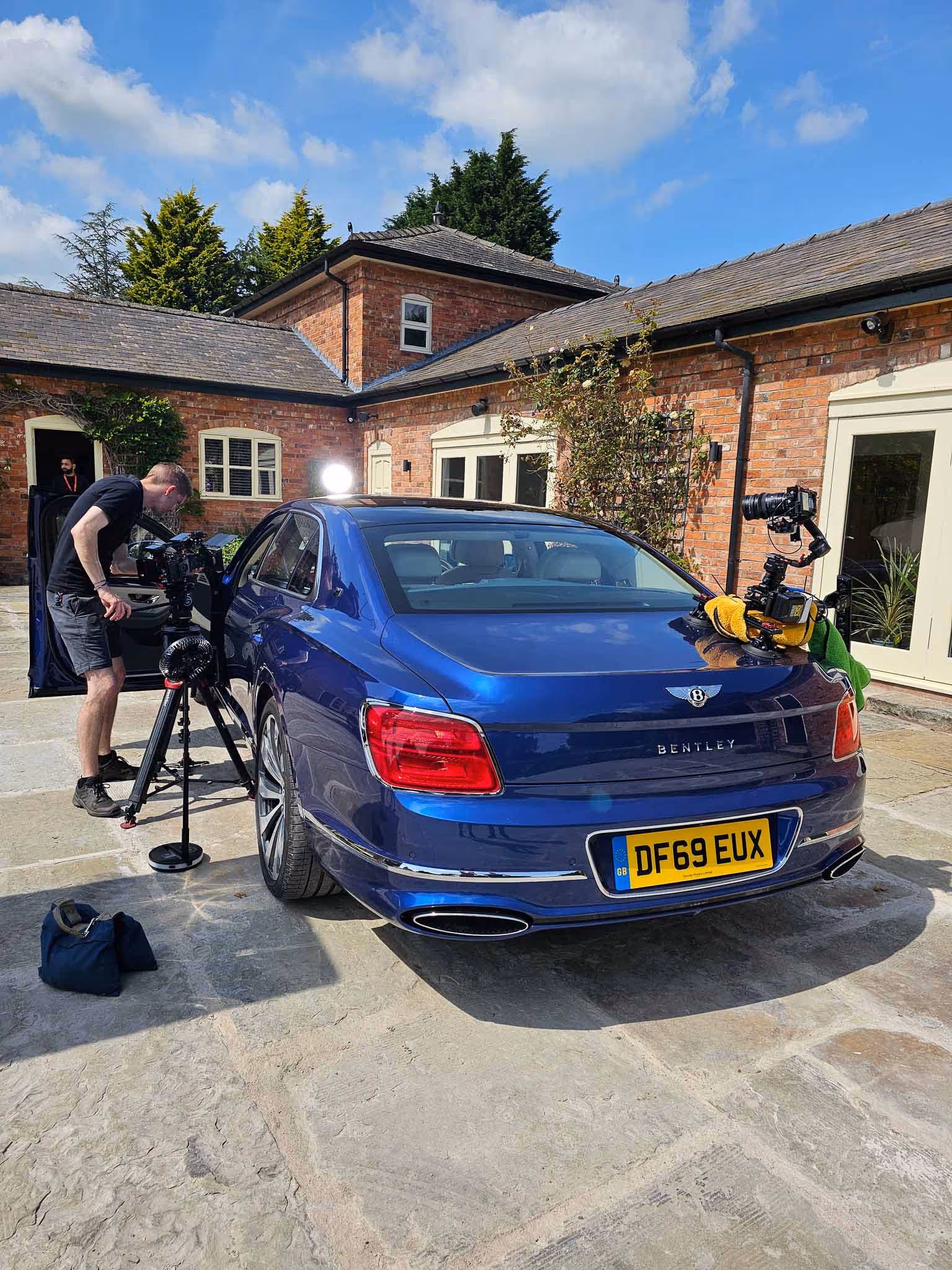 Blue sports car film recording