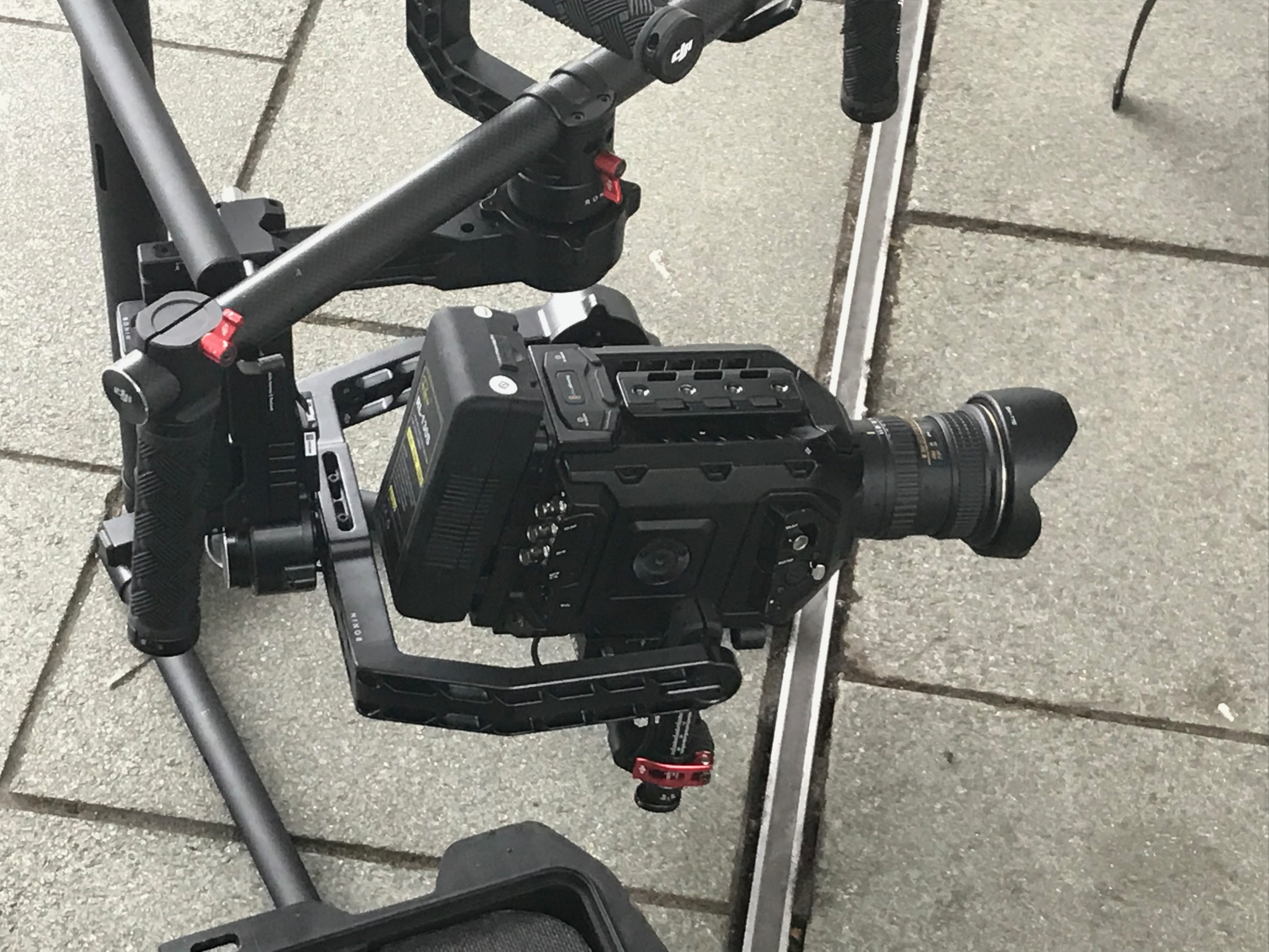 Professional video camera mounted on stabilizer rig.