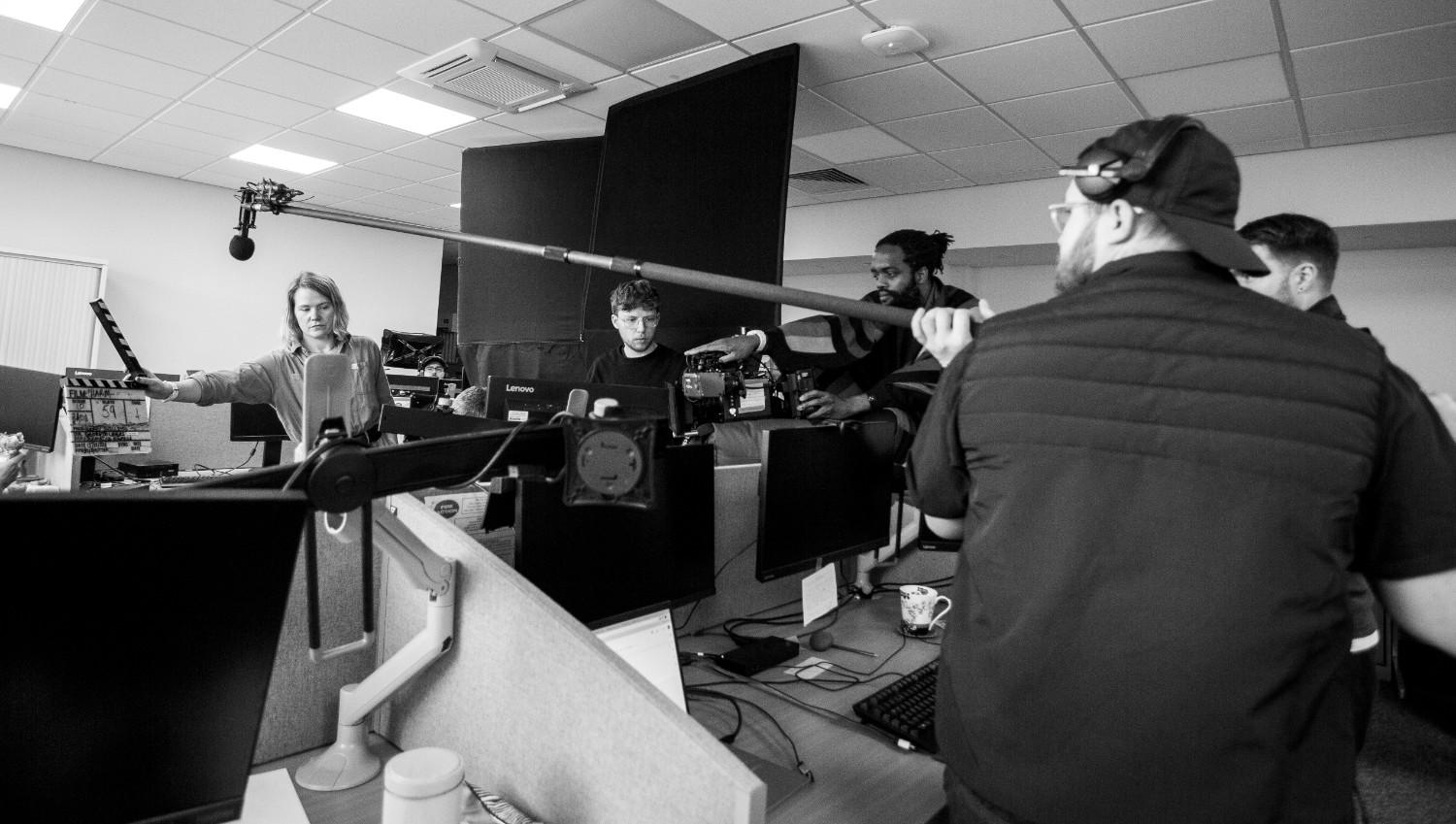 Video editors working in production studio