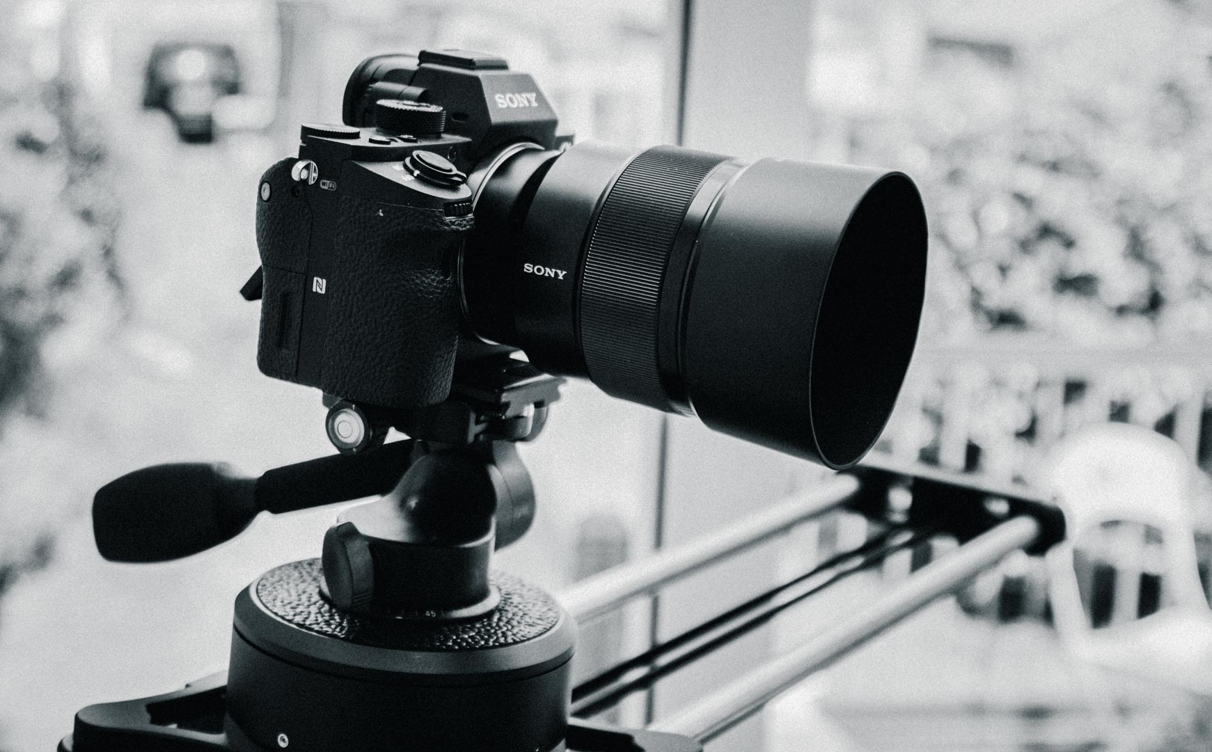 Sony camera on a tripod slider ready for a professional video production shoot