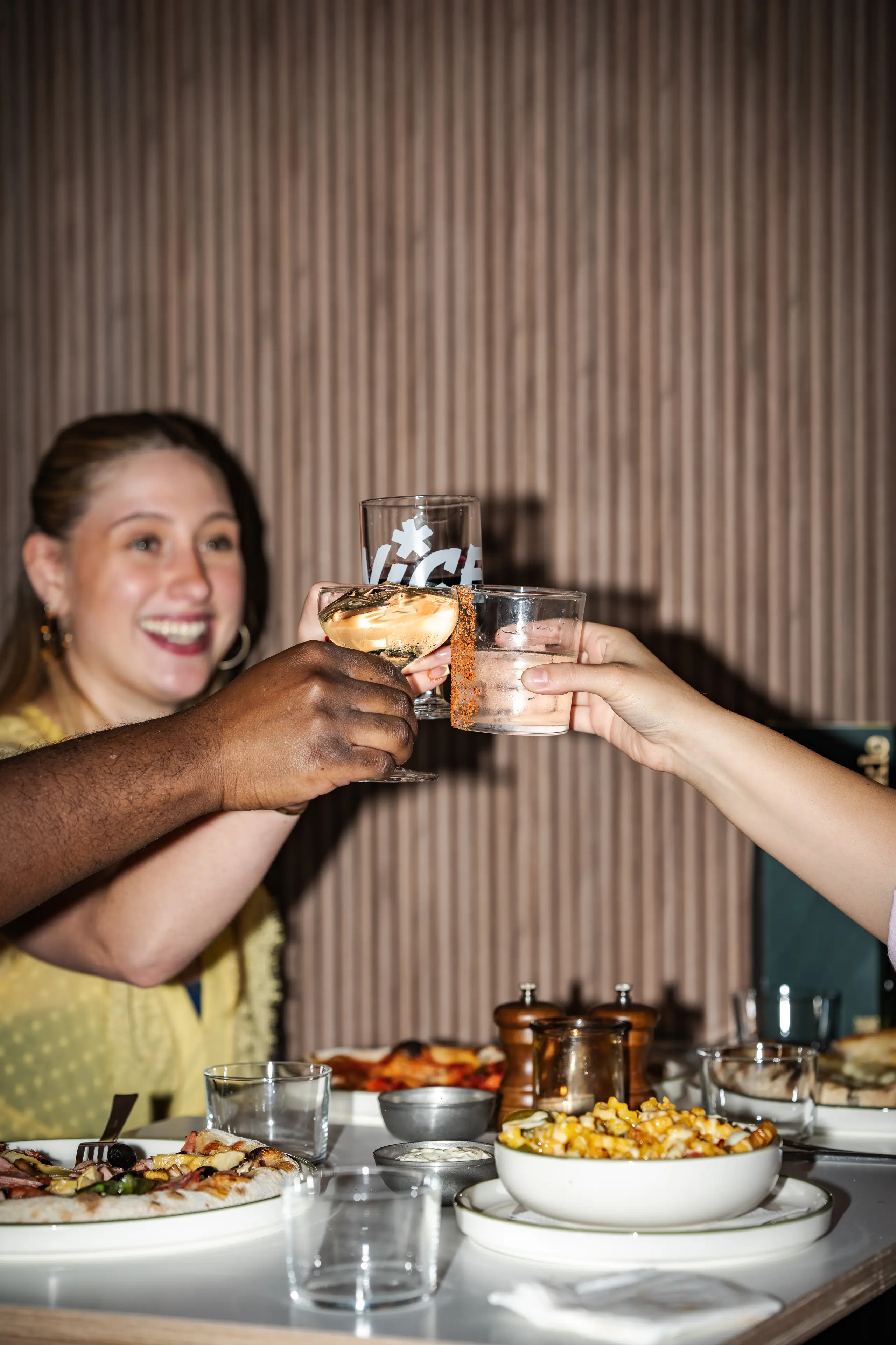 Guests toasting at Trickle