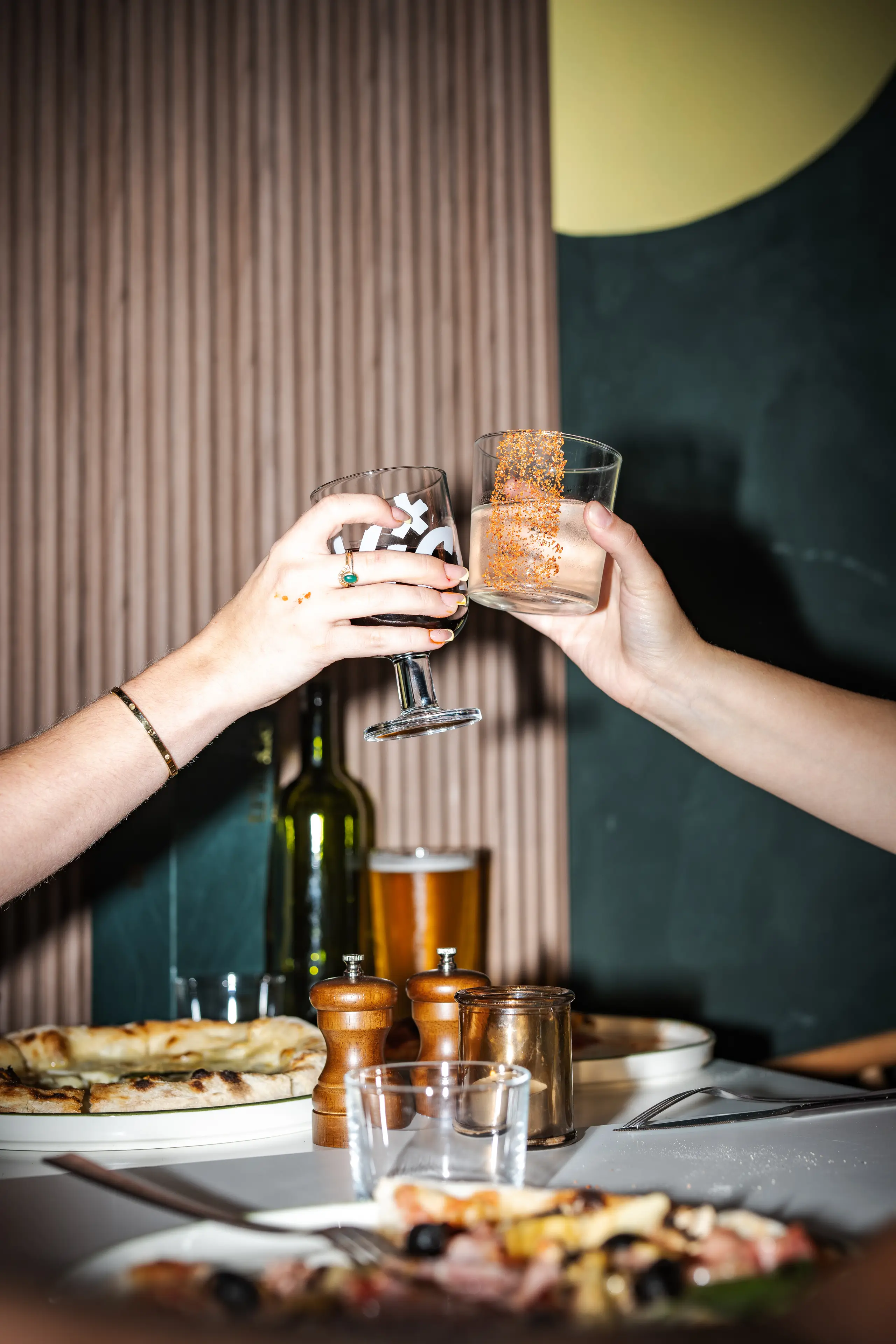 People making a toast at Trickle