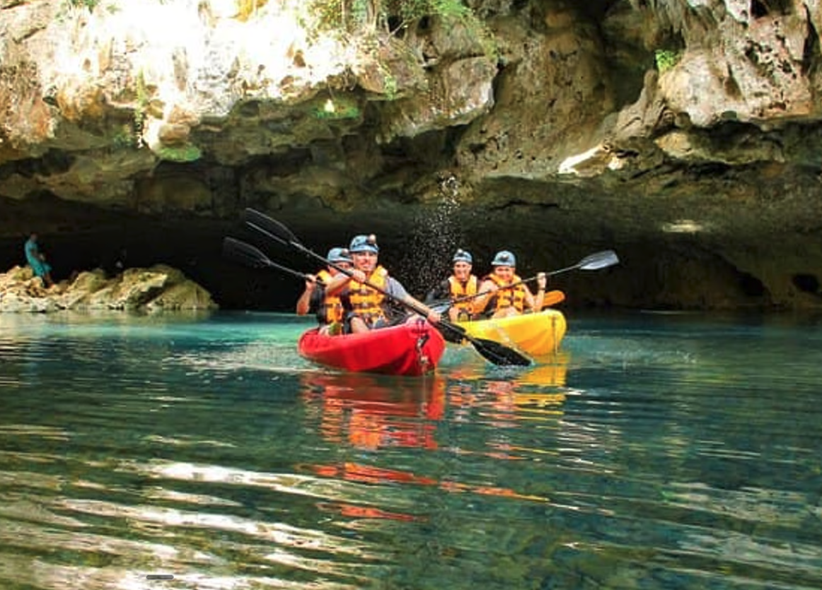 Cave kayaking through Barton Creek Cave near Xunantunich, Belize