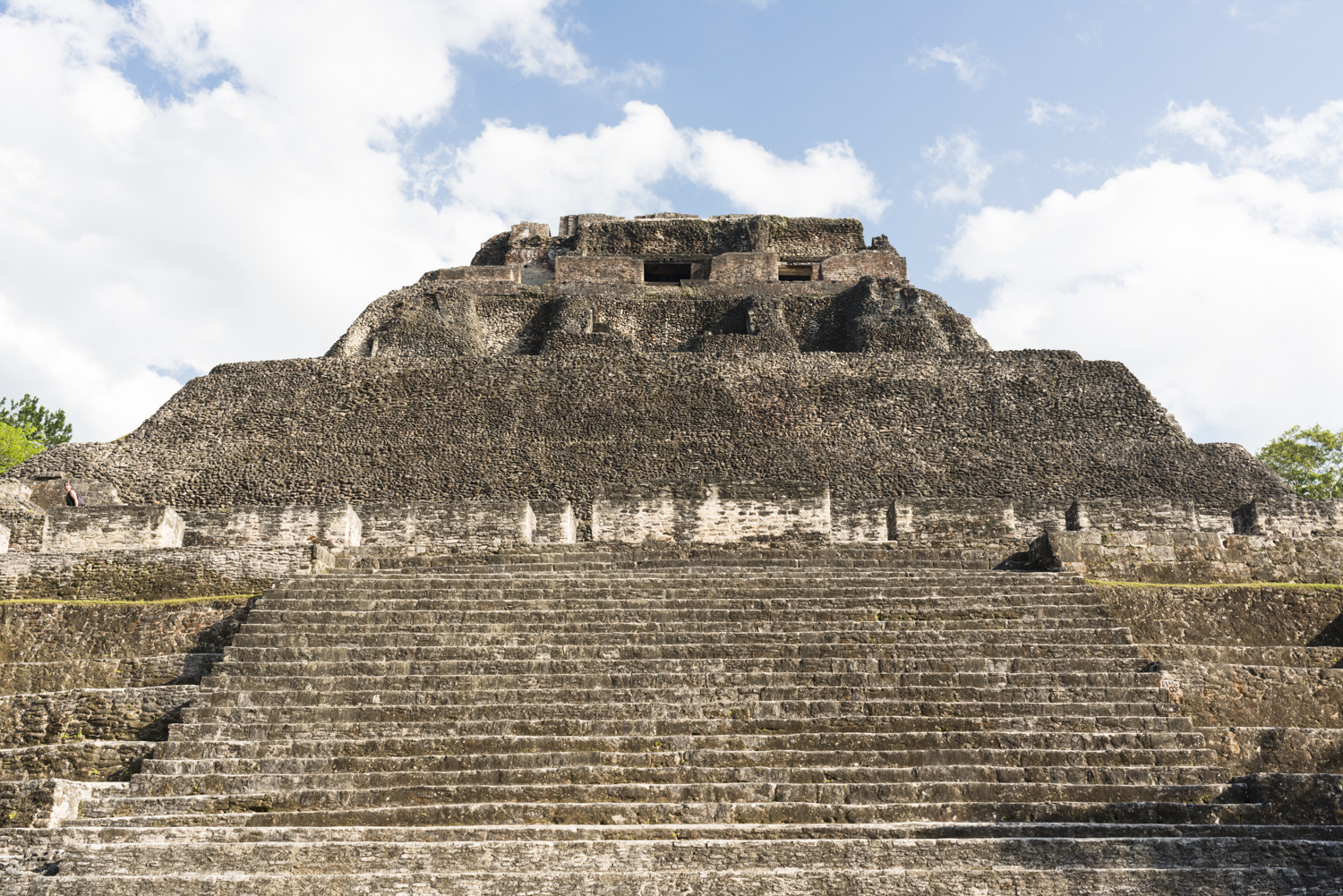 Low-angle view of El Castillo pyramid steps at Xunantunich, Belize