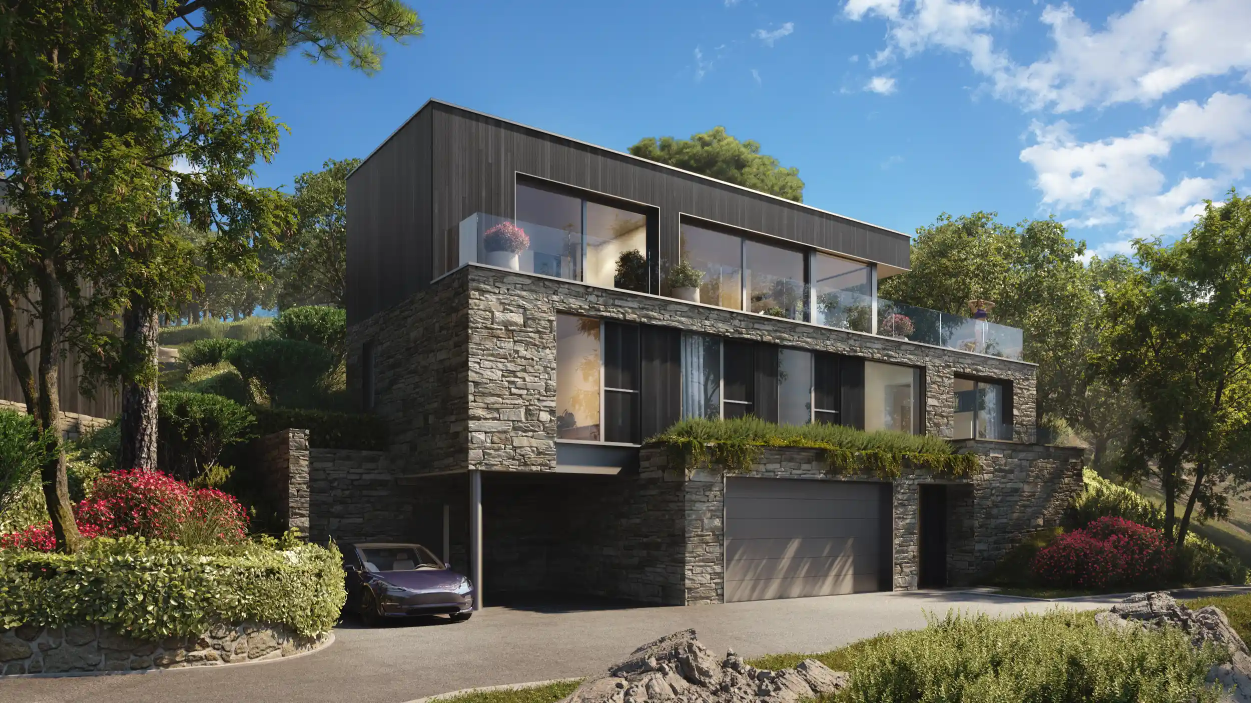 Modern two-story house with stone and dark panel exterior, large glass windows, greenery and a black car parked on the driveway.