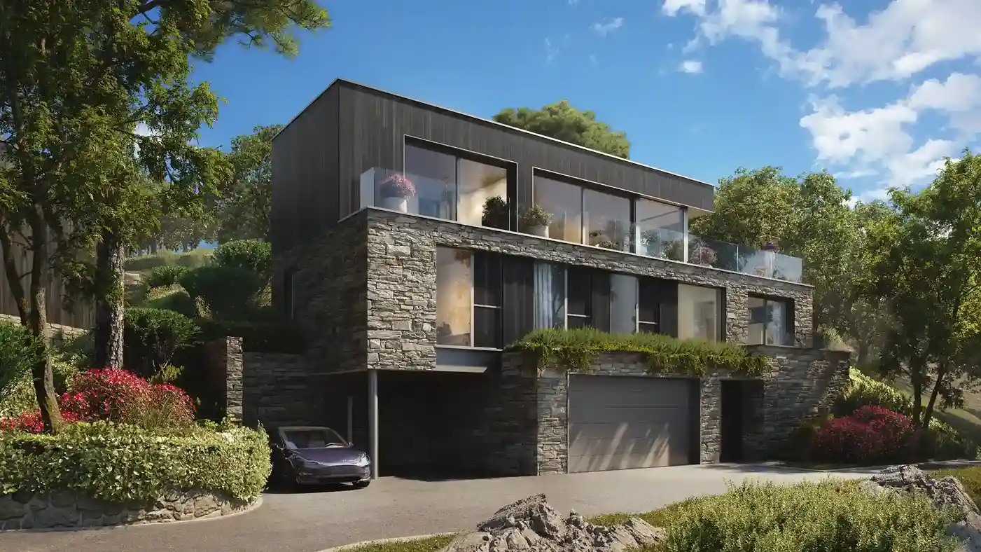 Modern two-story house with stone and dark wood exterior, large glass windows, double garage, surrounded by greenery and trees under a blue sky.