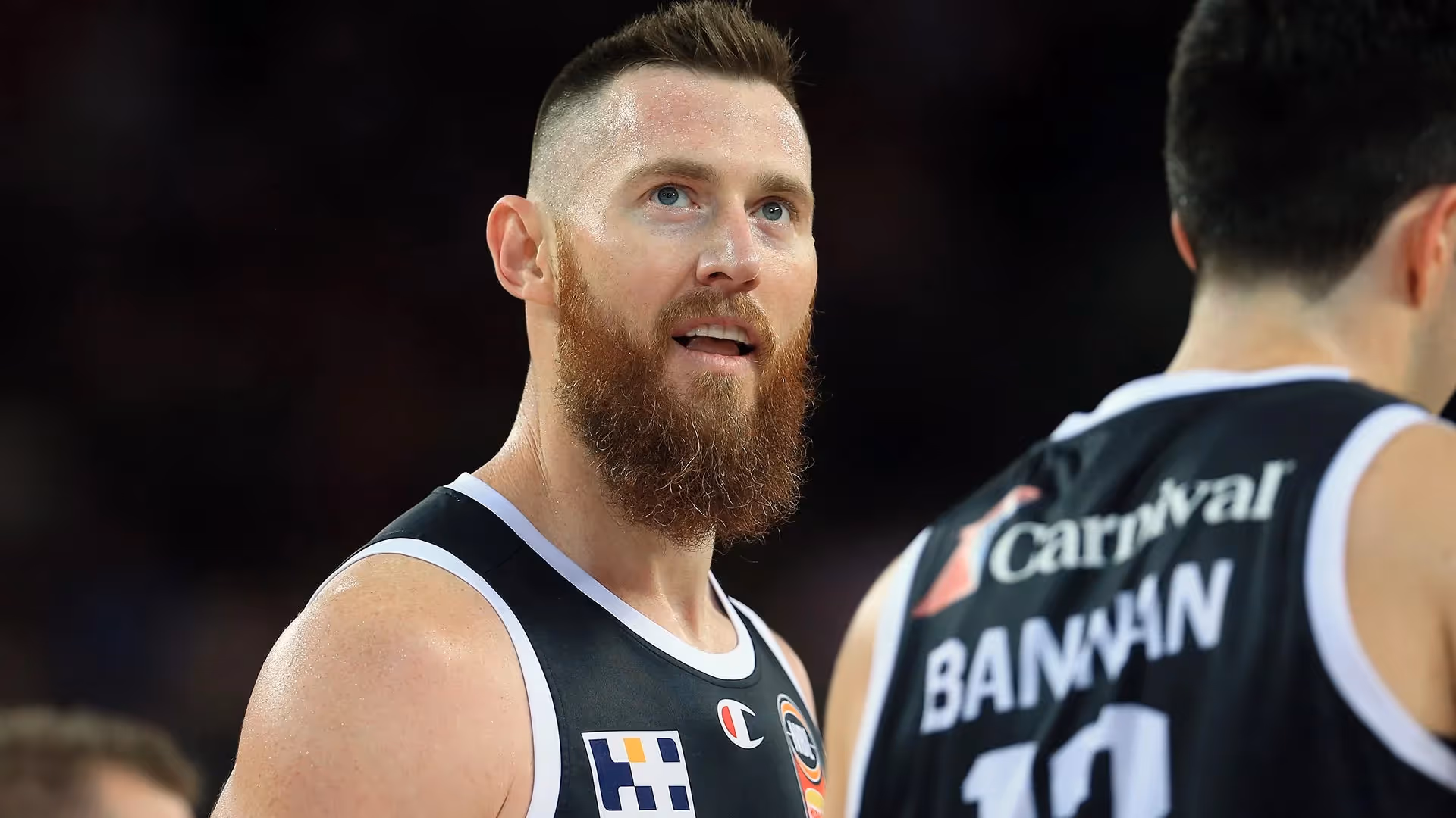 Baynes keeps door ajar