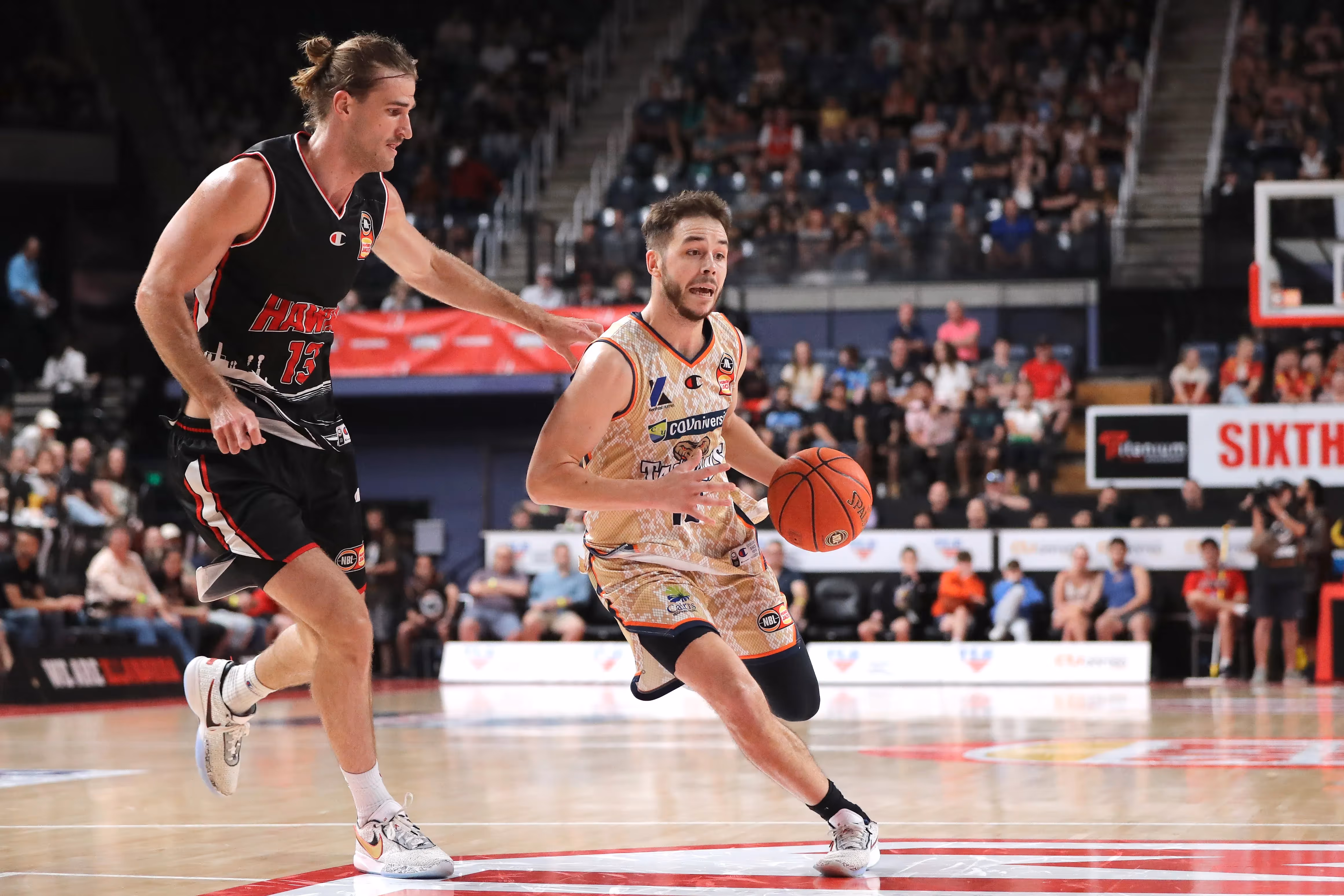 Taipans Hold Out Hawks for Crucial Road Win