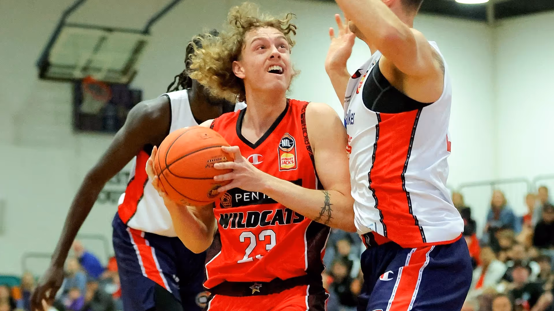 Travers, Thomas Spark Wildcats Over 36ers