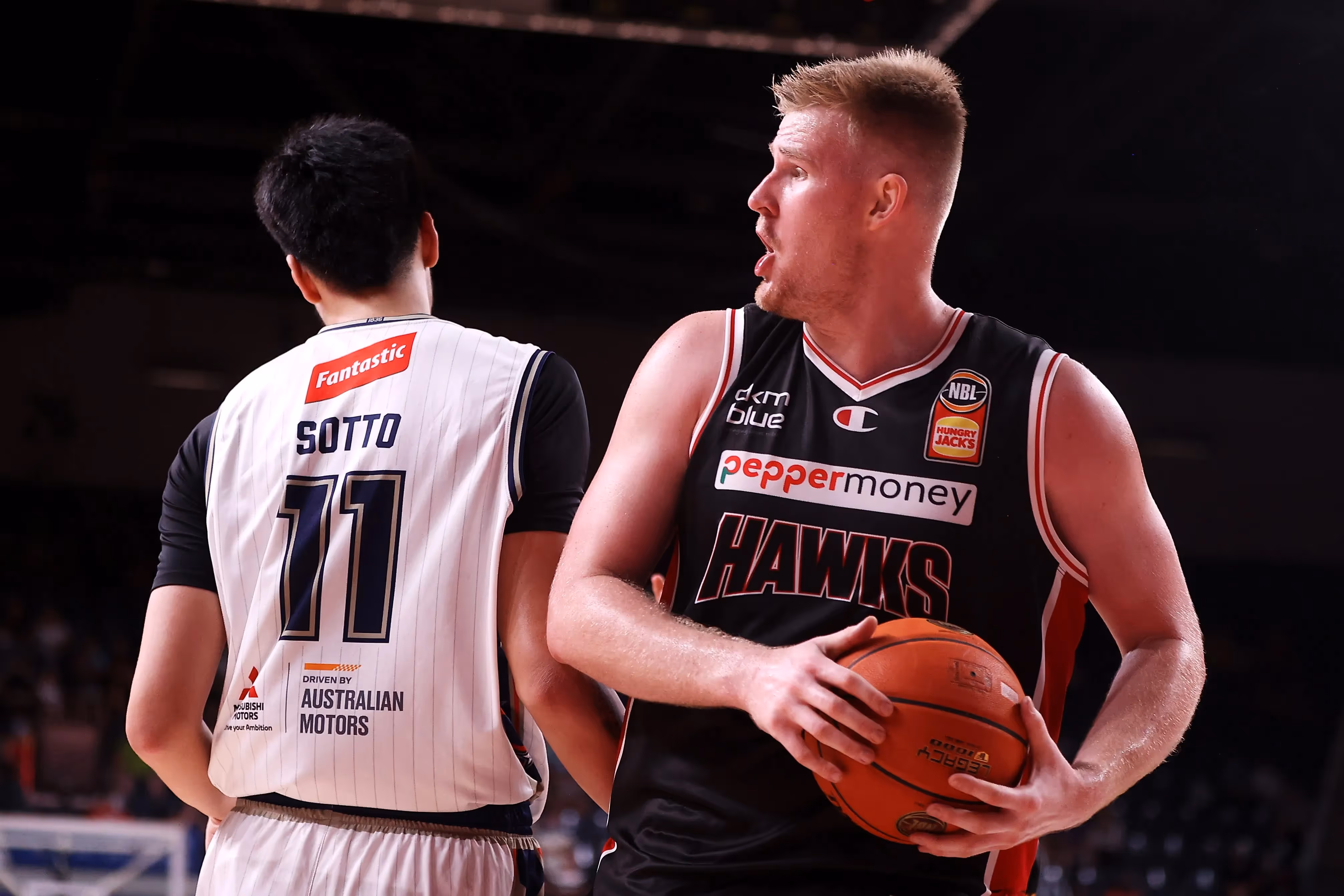 Harry's Eight Threes Lead Hawks to Bounce Back Win