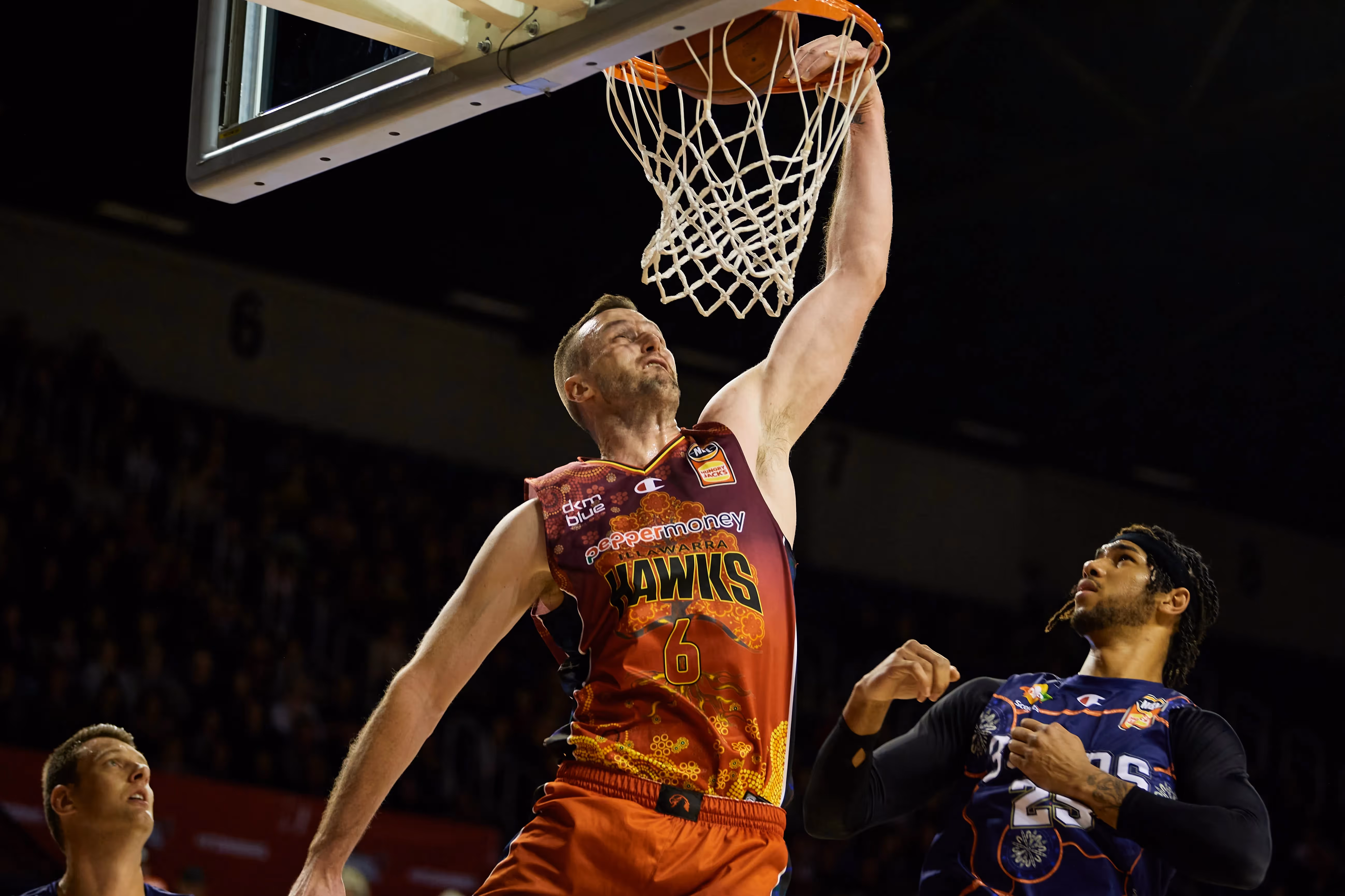 Hawks move to third with win over 36ers