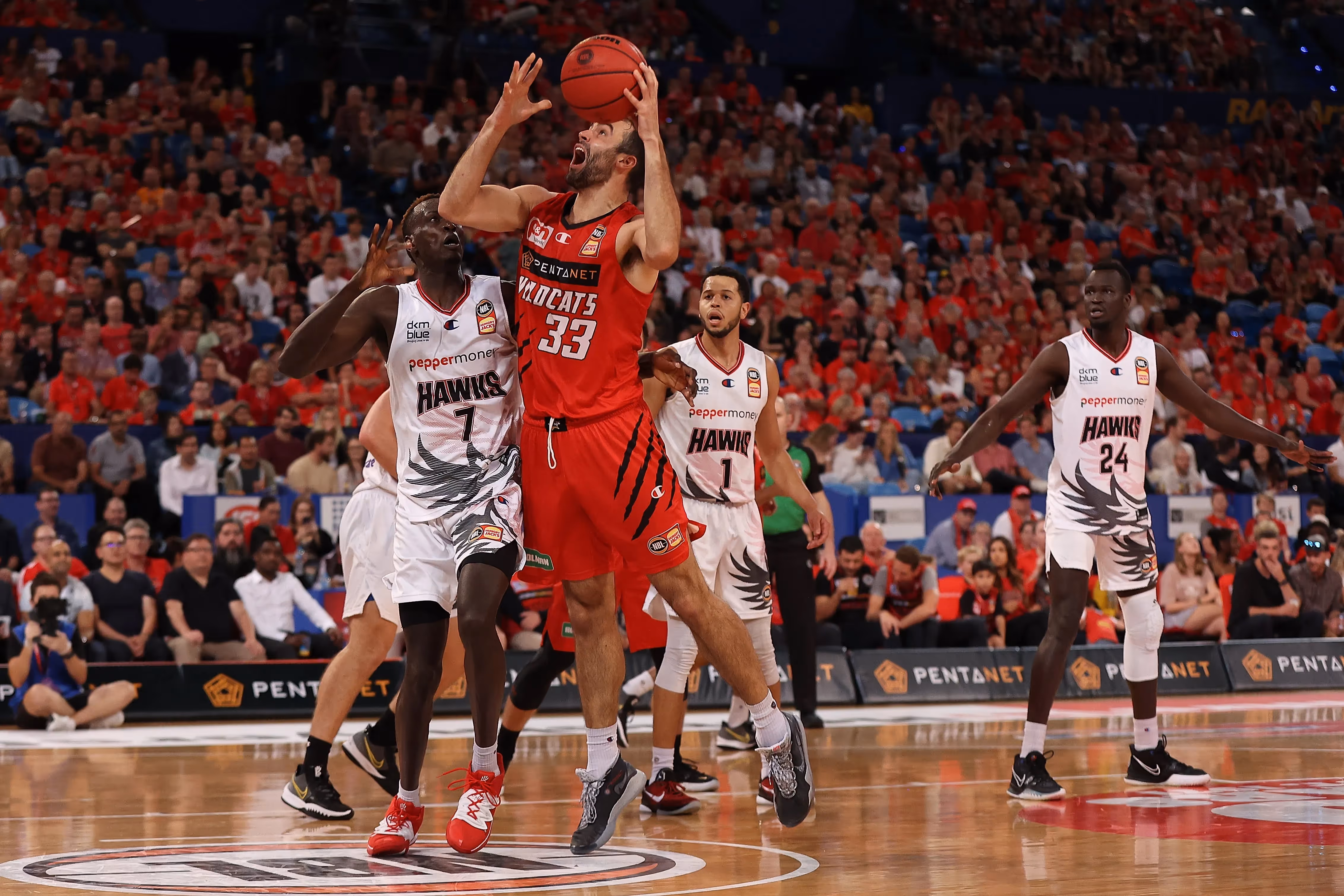 Wildcats too strong in second half for Hawks