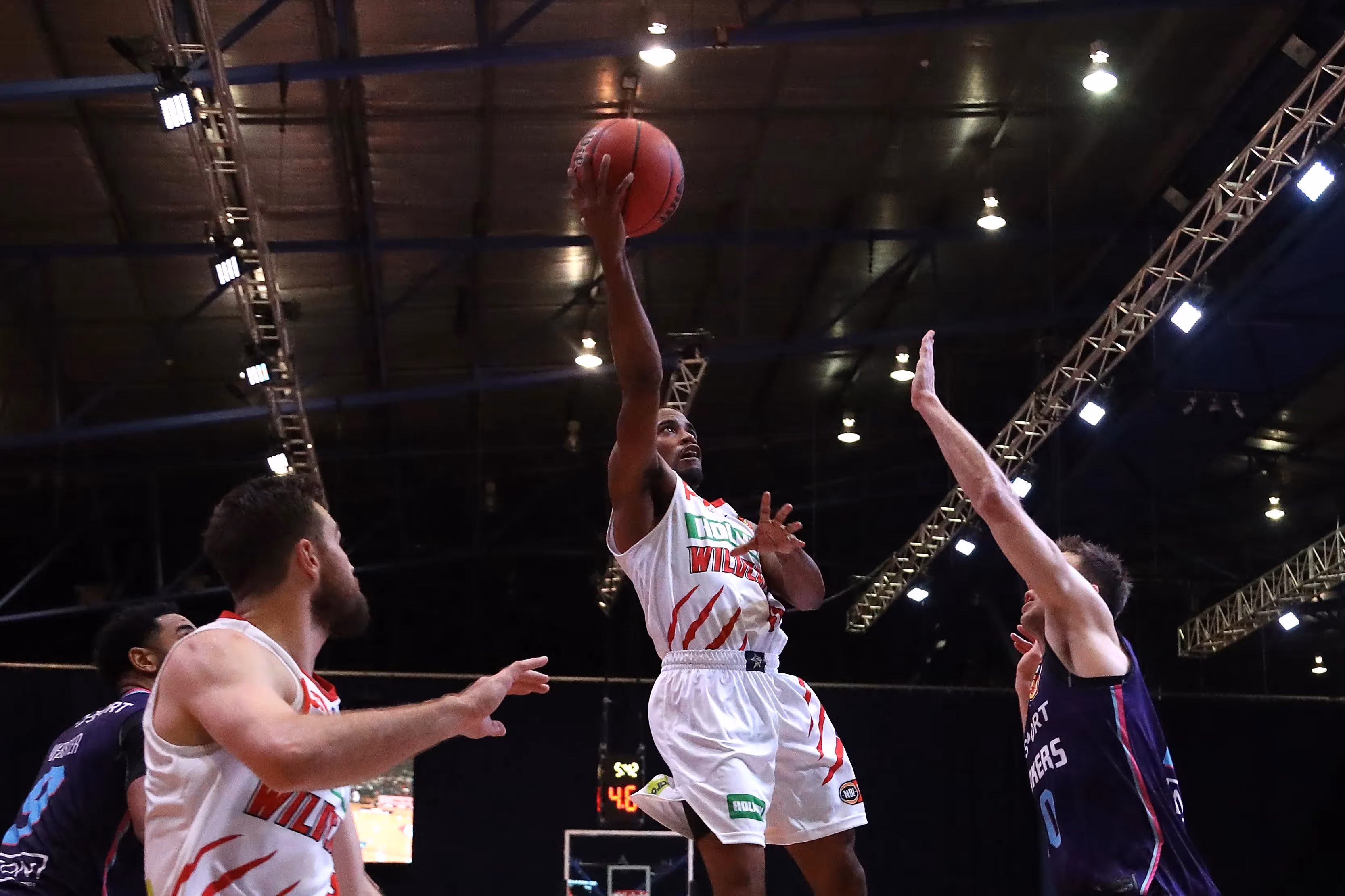 Cotton shakes off woes to deliver 'Cats OT win