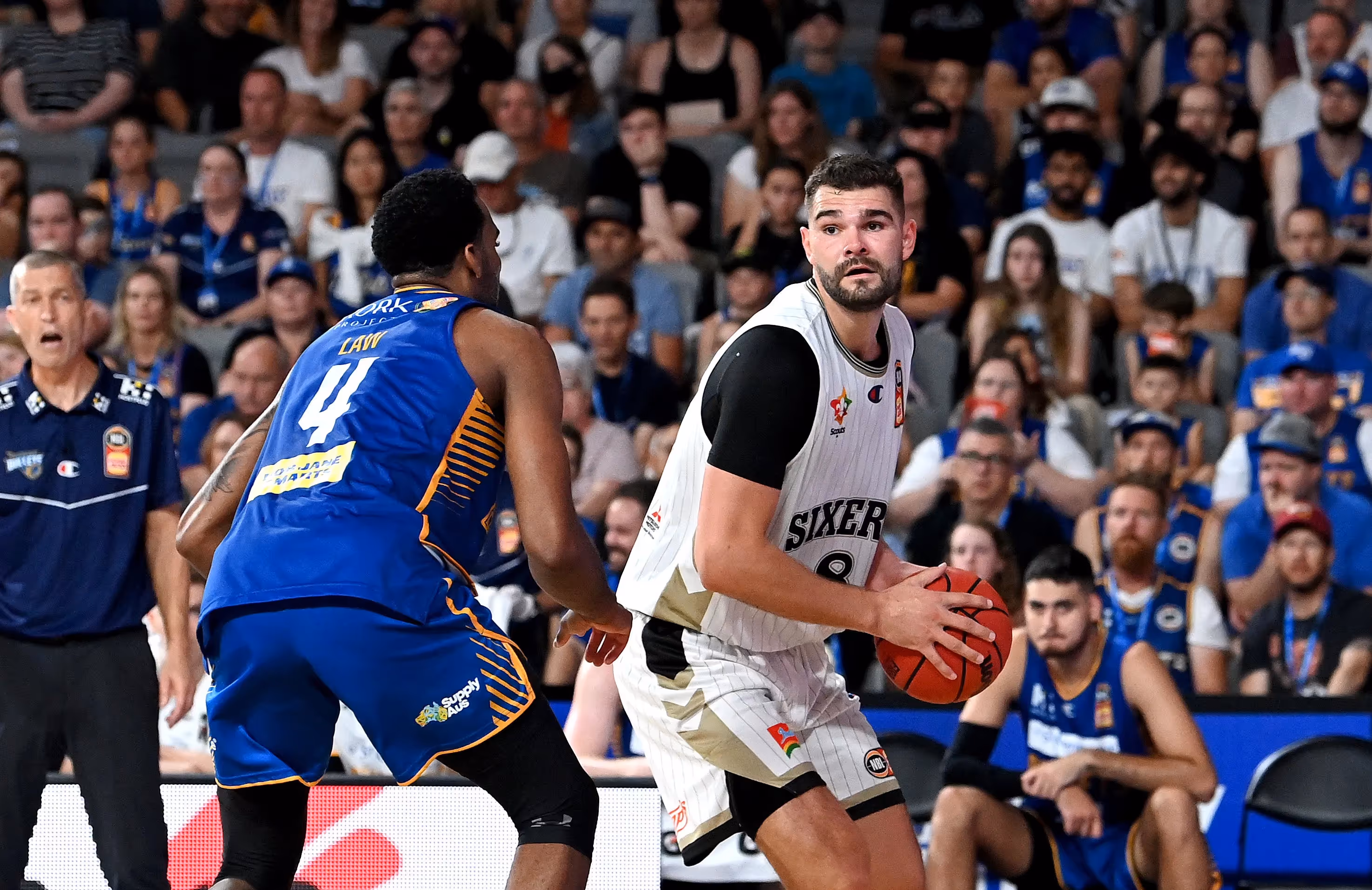Sixers' Twin Towers Dominate Bullets