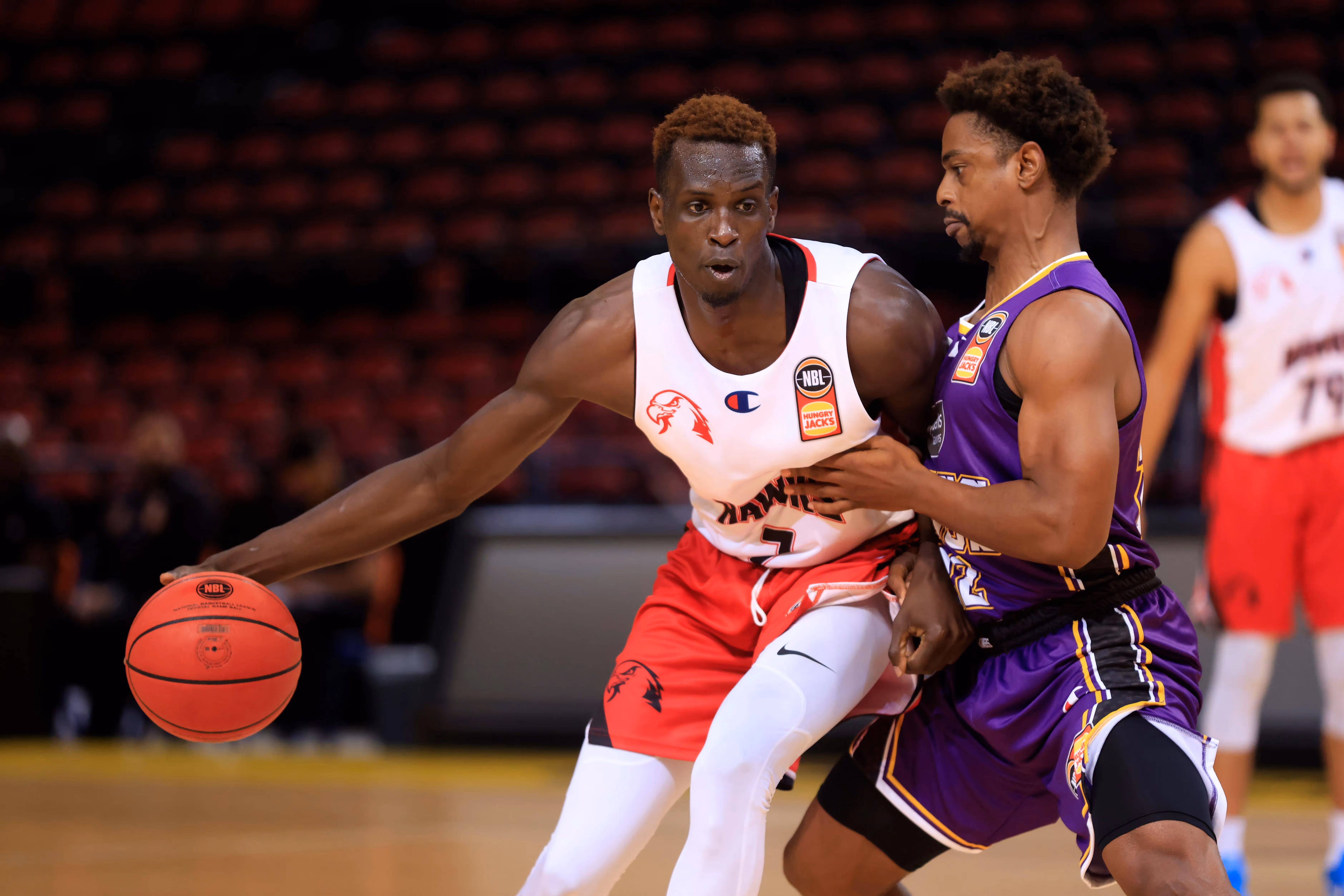 Kings fire and withstand late charge from Hawks