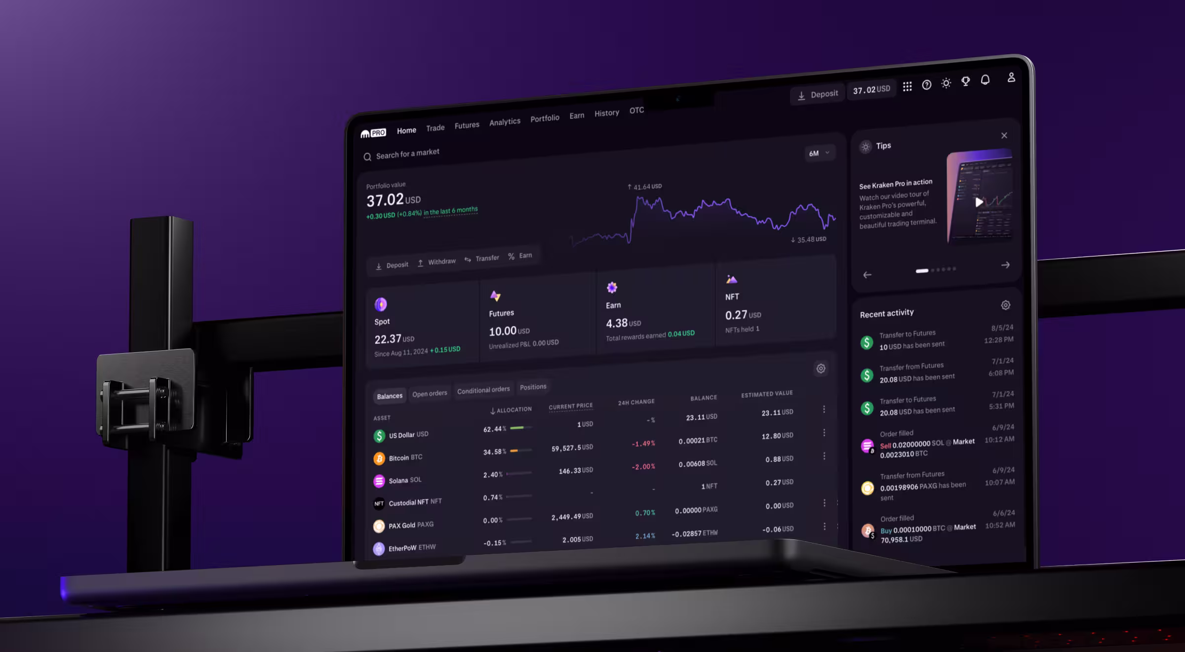 The image displays a laptop screen showcasing the dark-mode interface of a professional cryptocurrency trading platform Kraken Pro. The dashboard shows a portfolio value of $37.02 USD with a line graph depicting performance over the past six months. Key sections highlight balances across Spot, Futures, Earn, and NFT holdings. Below, a detailed table presents assets such as USD, Bitcoin, Solana, and Ethereum, with columns for allocation, current price, 24-hour change, and estimated value. The right panel includes a video tip about Kraken Pro and a timeline of recent activity like fund transfers and order executions. The overall aesthetic is sleek and data-rich, set against a purple gradient background.