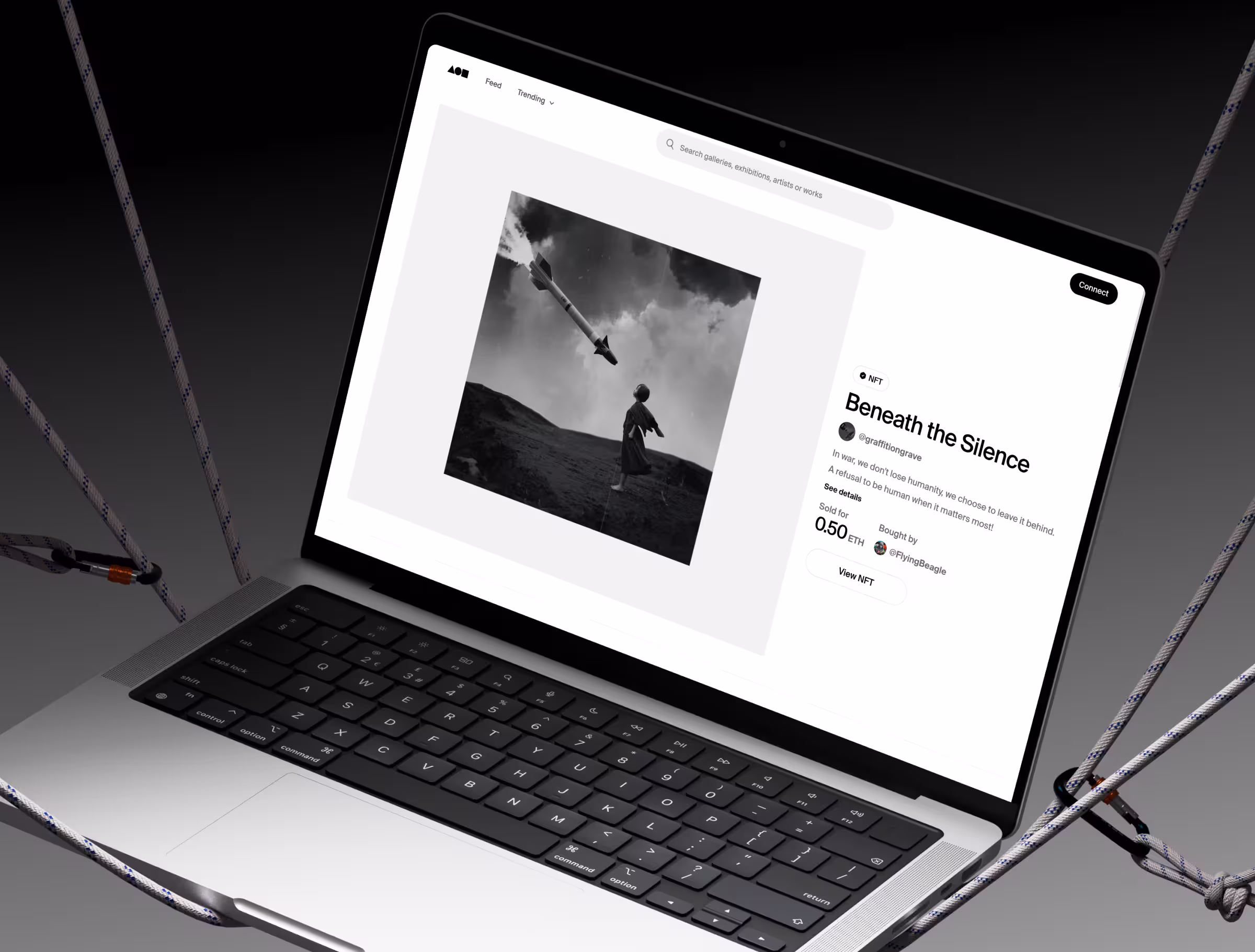 A laptop displaying the Foundation NFT marketplace with a black-and-white artwork titled "Beneath the Silence" on screen. The piece is listed as sold for 0.50 ETH and includes a short poetic description and buyer information.