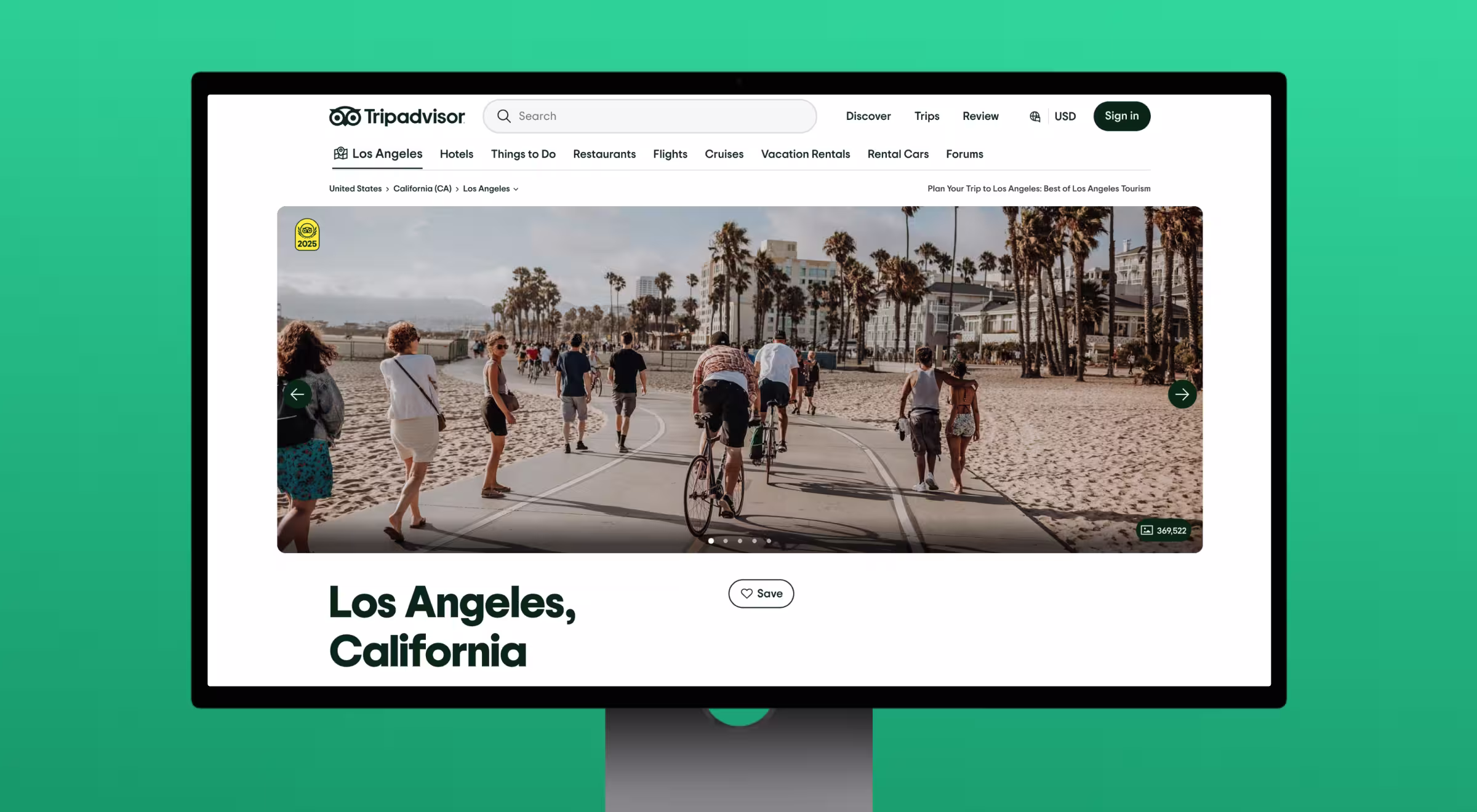 Screenshot of the TripAdvisor webpage for Los Angeles, California, displayed on a desktop monitor with a green background. The page features a large header image of people walking and biking along a beach path lined with palm trees. The navigation menu includes options for Hotels, Things to Do, Restaurants, Flights, Cruises, Vacation Rentals, Rental Cars, and Forums. The title “Los Angeles, California” is prominently displayed below the image, along with a heart-shaped “Save” button.