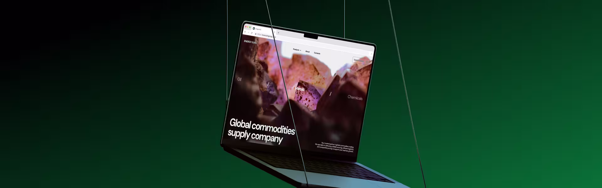 Laptop displaying modern global commodities website with clean web design