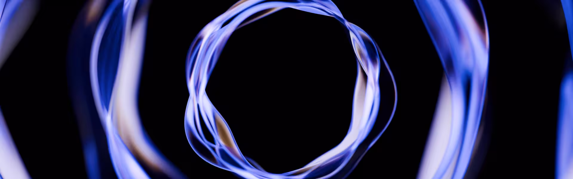 Abstract blue light rings on a dark background — modern digital motion design visual for creative web design and branding