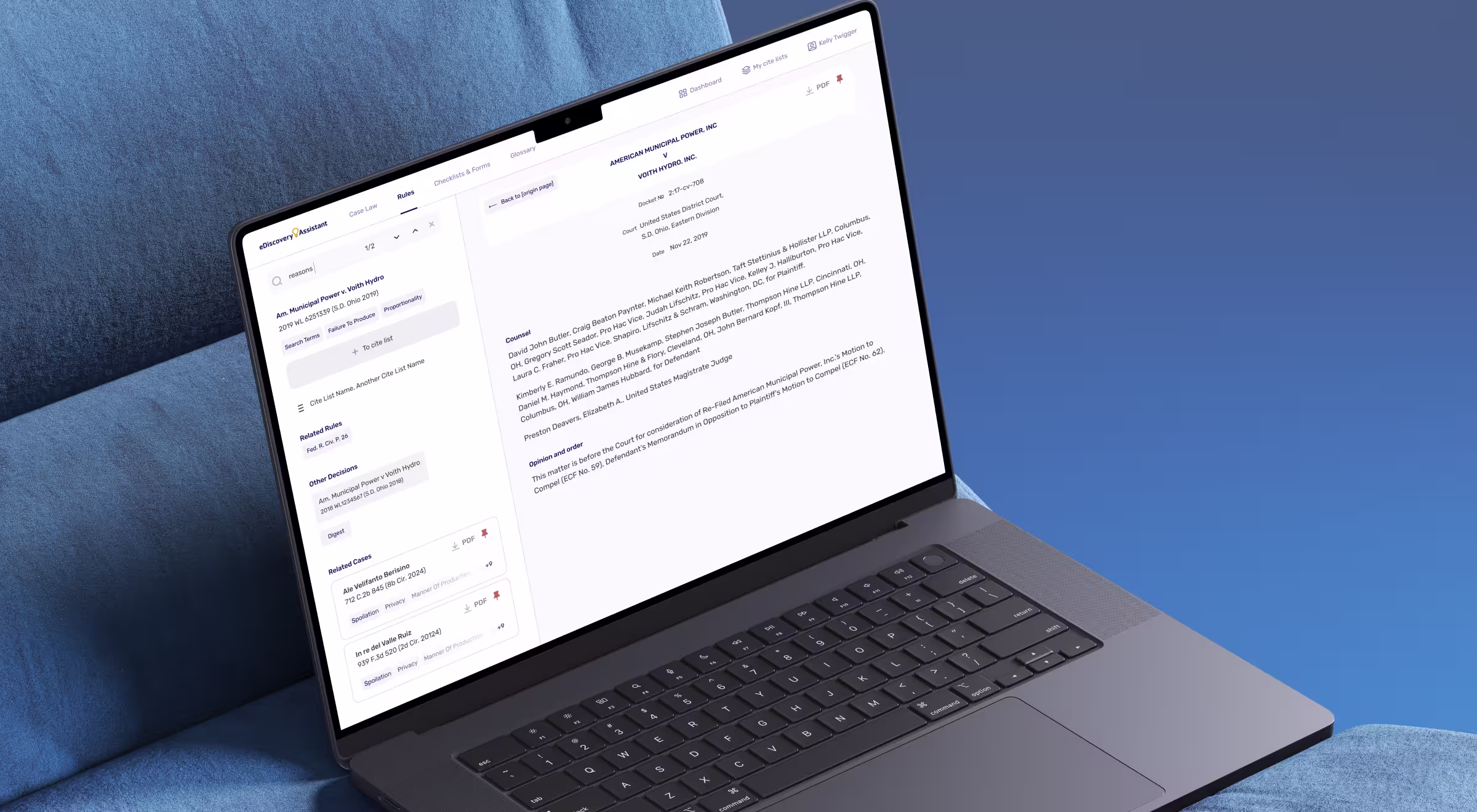 Laptop displaying a legal case review interface from eDiscovery Assistant, resting on a blue fabric surface against a gradient blue background