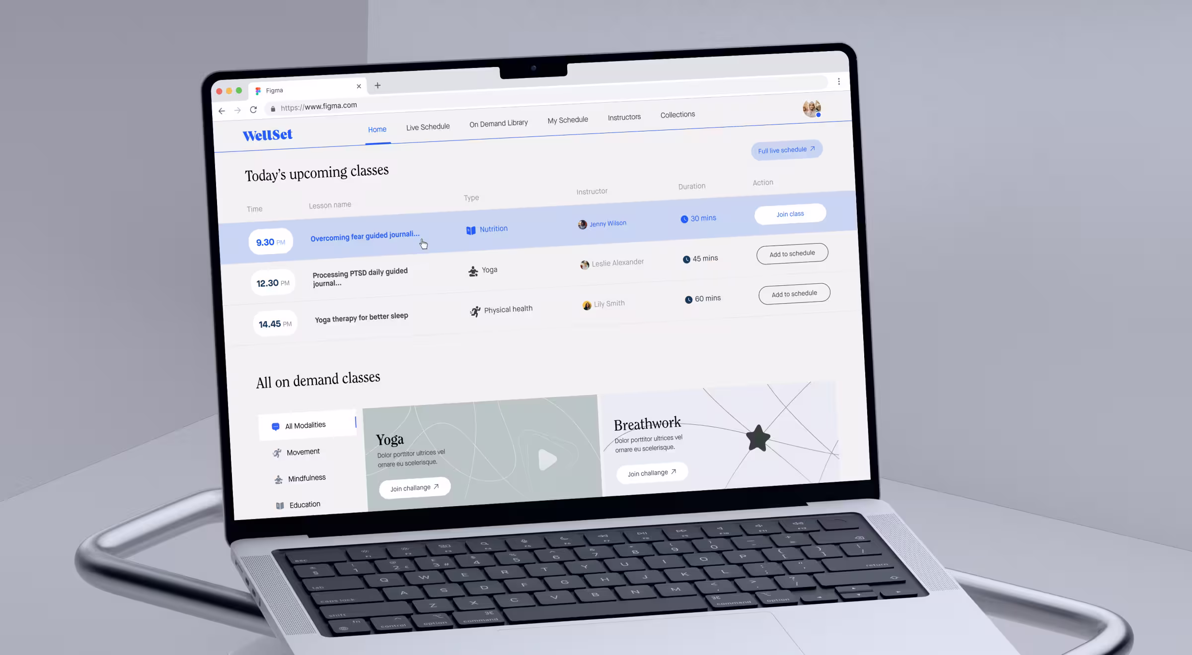 Laptop displaying WellSet’s class schedule page with upcoming live sessions, instructor details, and on-demand wellness class categories
