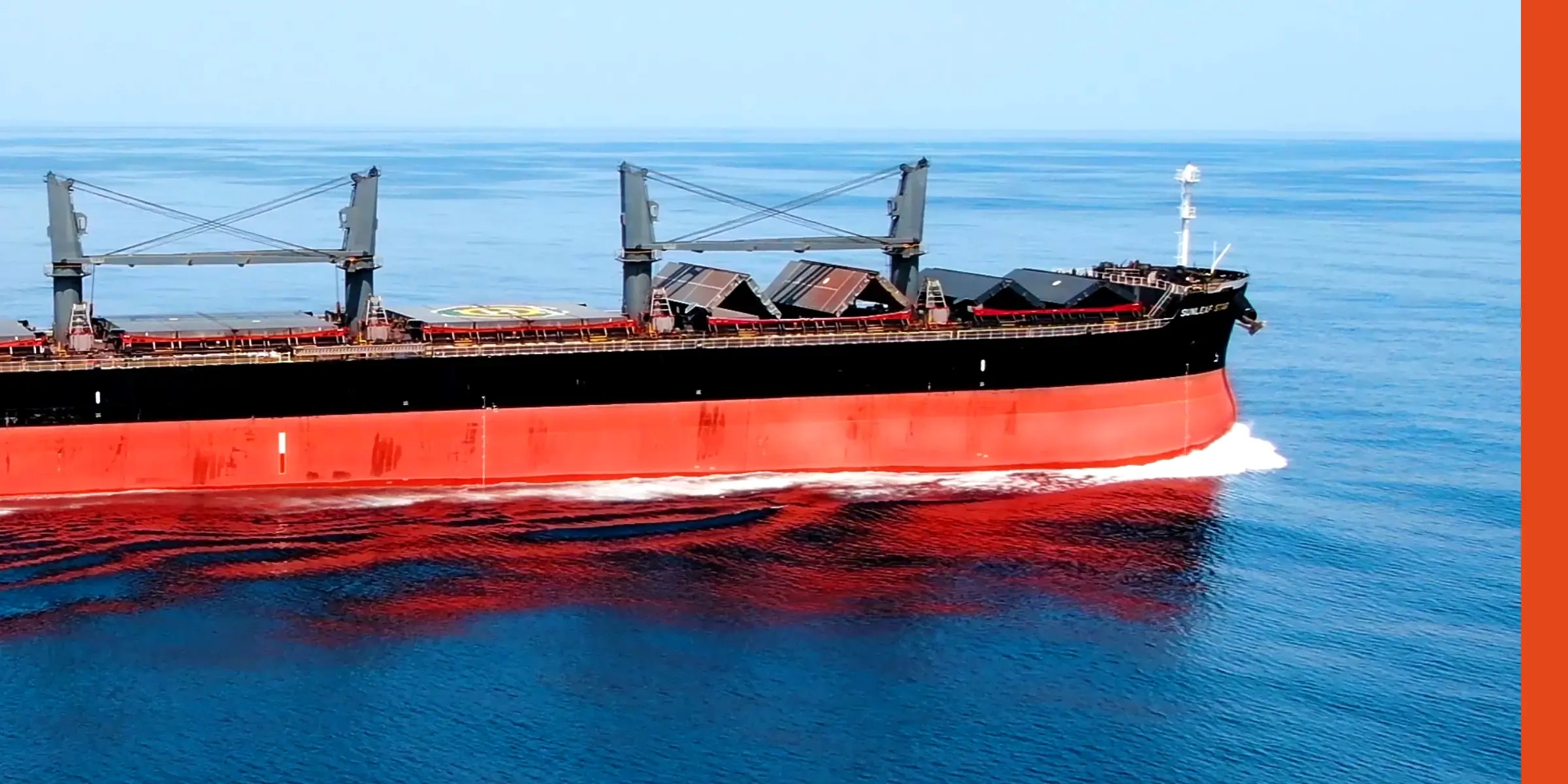 Large bulk carrier vessel transporting cargo across open waters, illustrating maritime logistics, global shipping operations, and commercial freight transportation within the international supply chain.