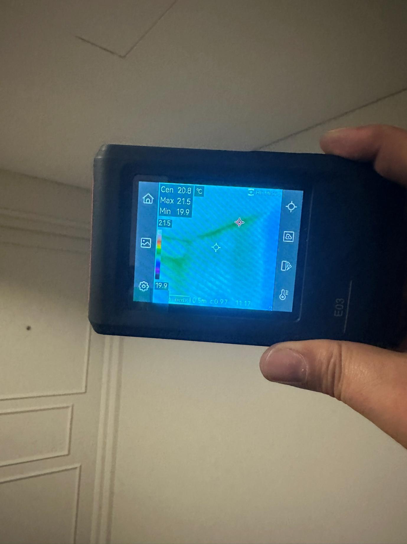 Thermal imaging scan identifying concealed moisture beneath a building surface.