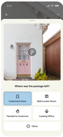 Mobile app screen with a package delivery question and a photo of a pink door on a white brick wall.