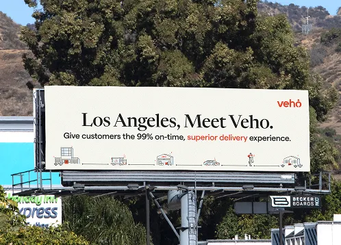 Billboard advertising Veho with message on superior delivery experience in Los Angeles.