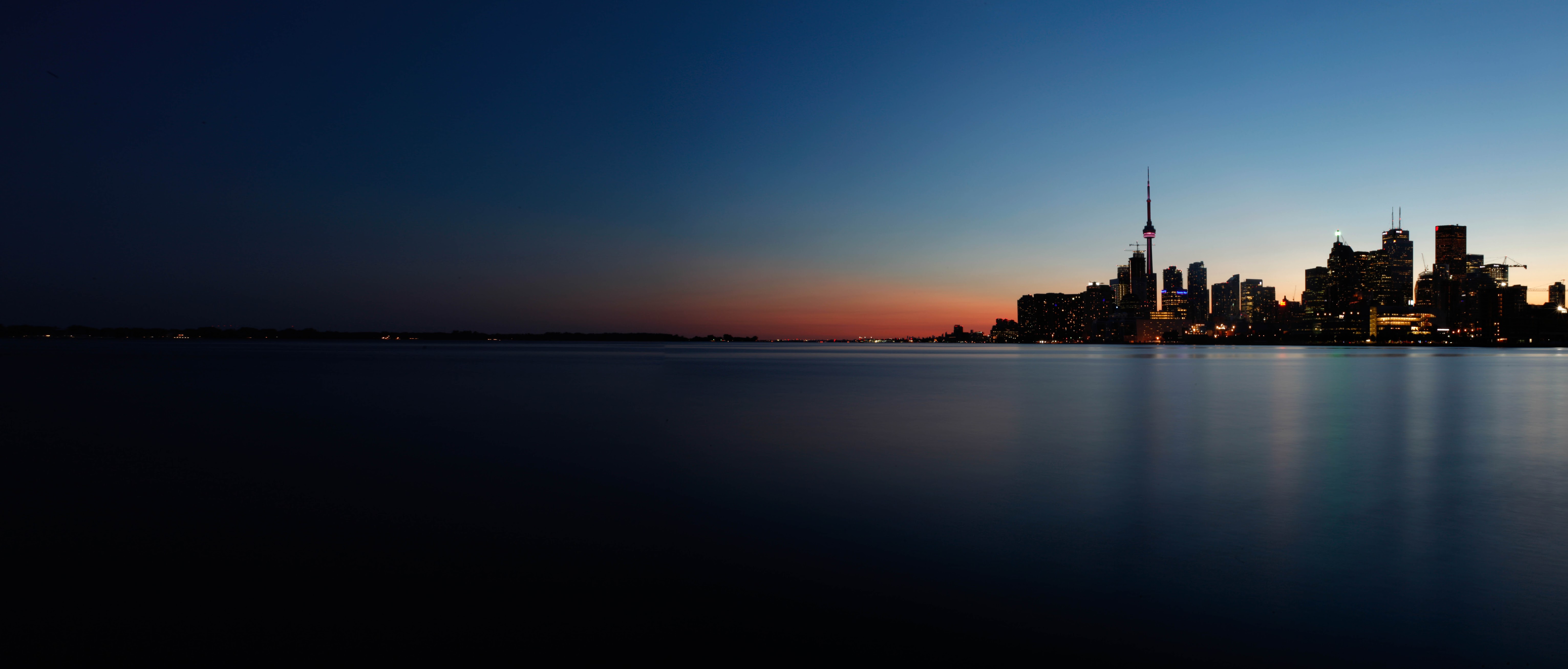 Archival 2016 editorial panorama of the Toronto skyline at sunset; not a depiction of September 2026 market data.