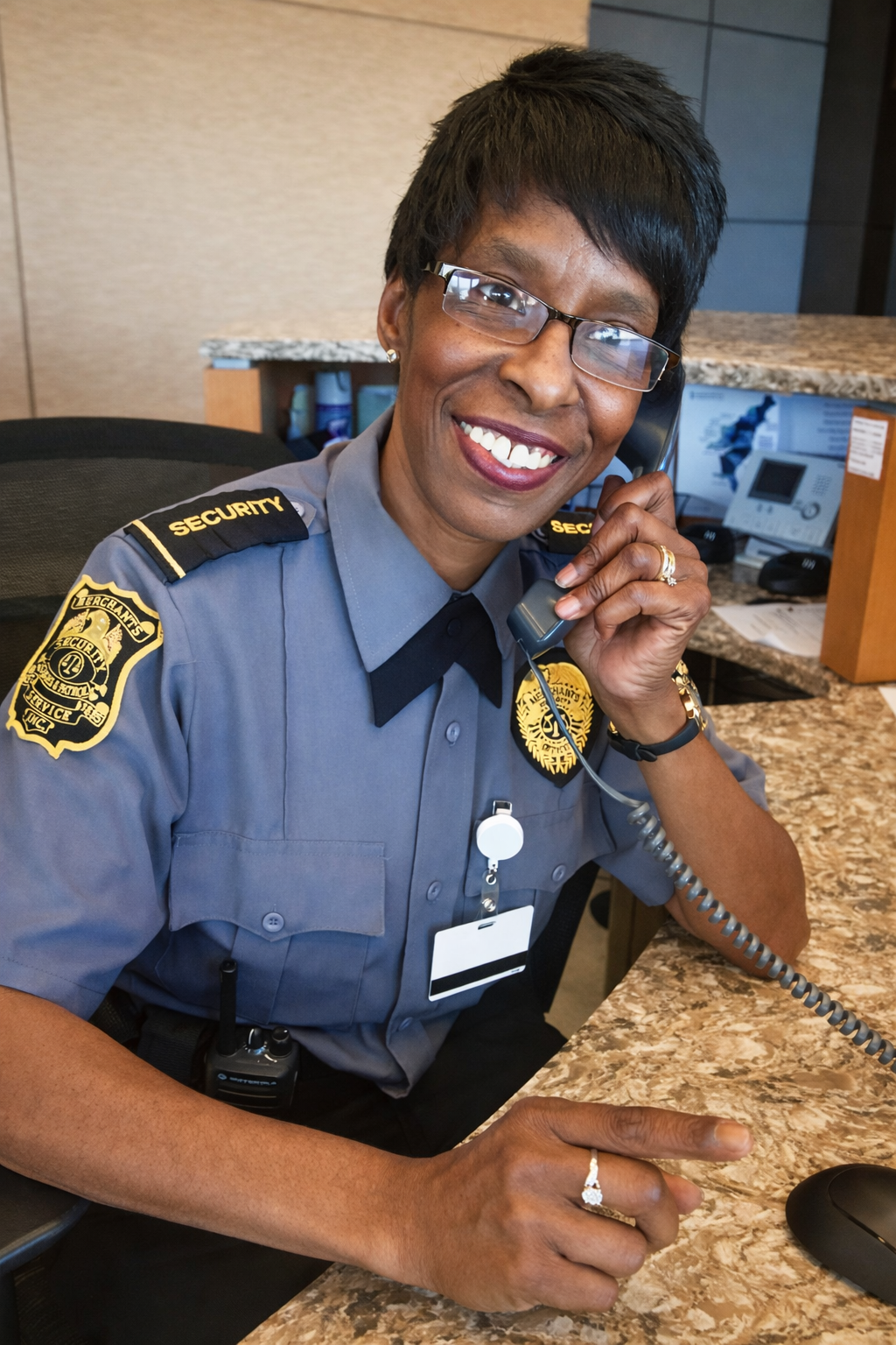 a female officer talking on a phone