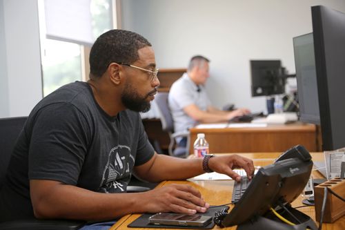 Abrasive Technology employee working at his desk in the office
