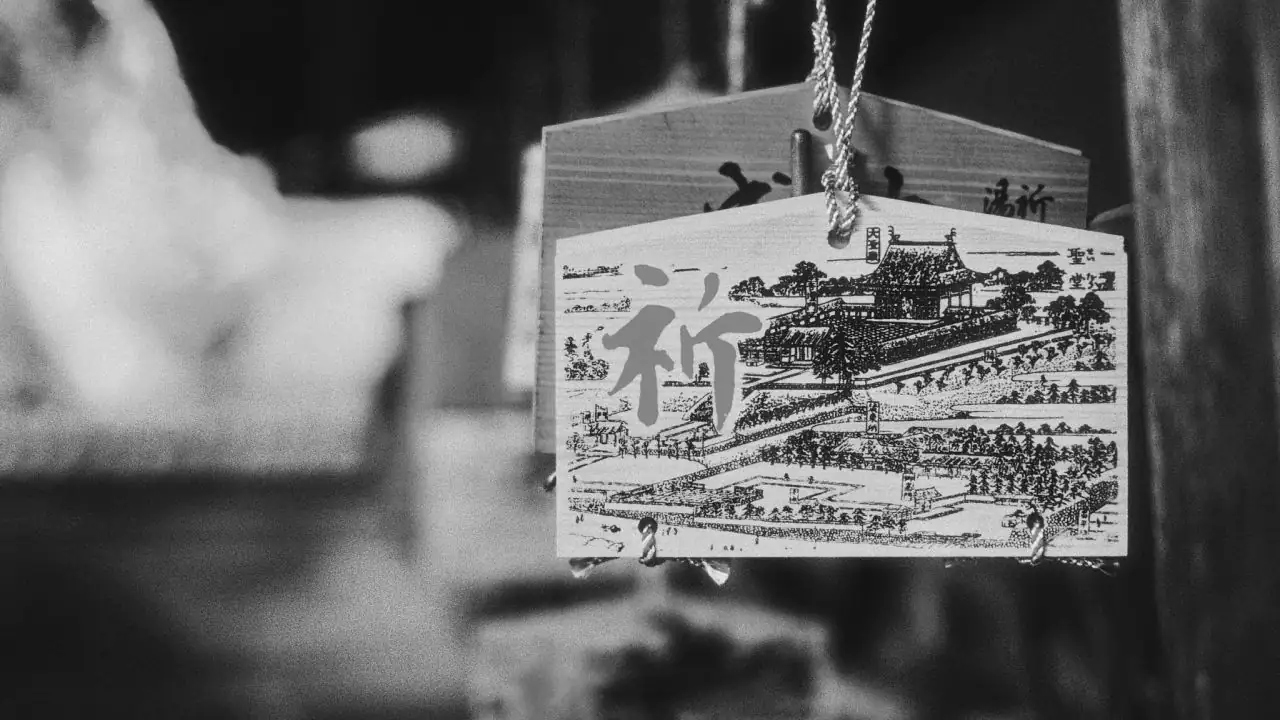 A photo of a japanese ema wood block at a shrine