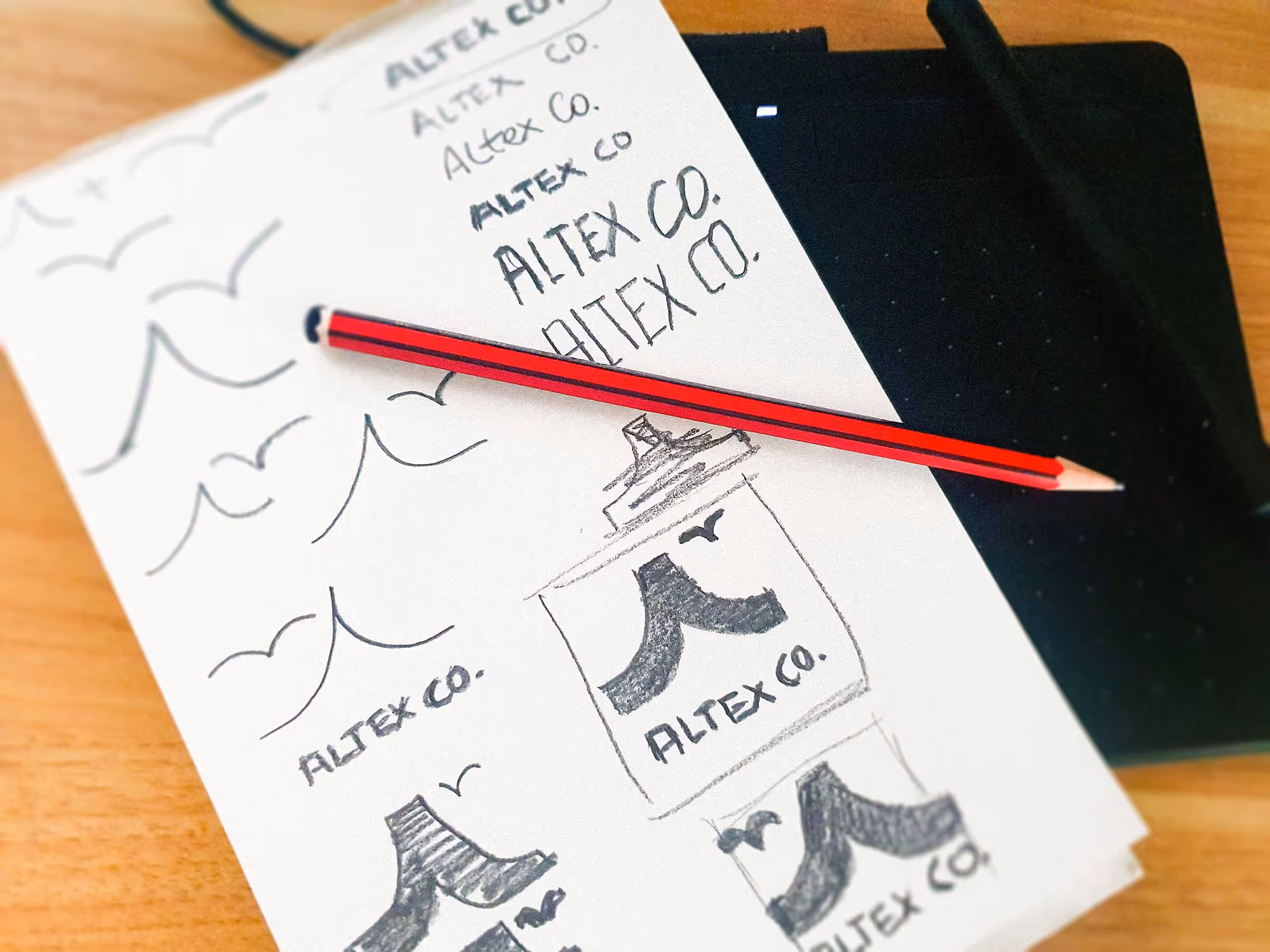 Altex Co. logo sketch exploration. Shows design process.